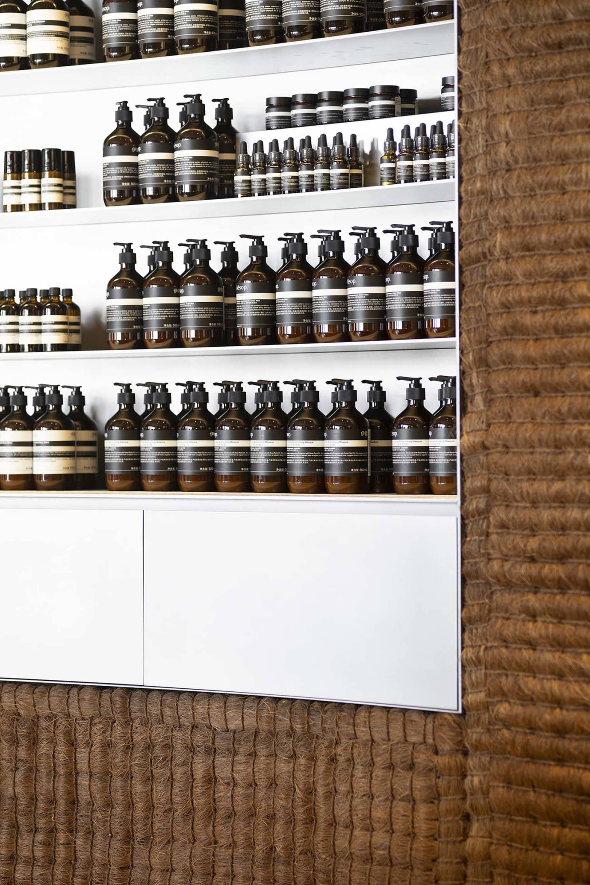 Modern retail shelves with plastic and wood materials.