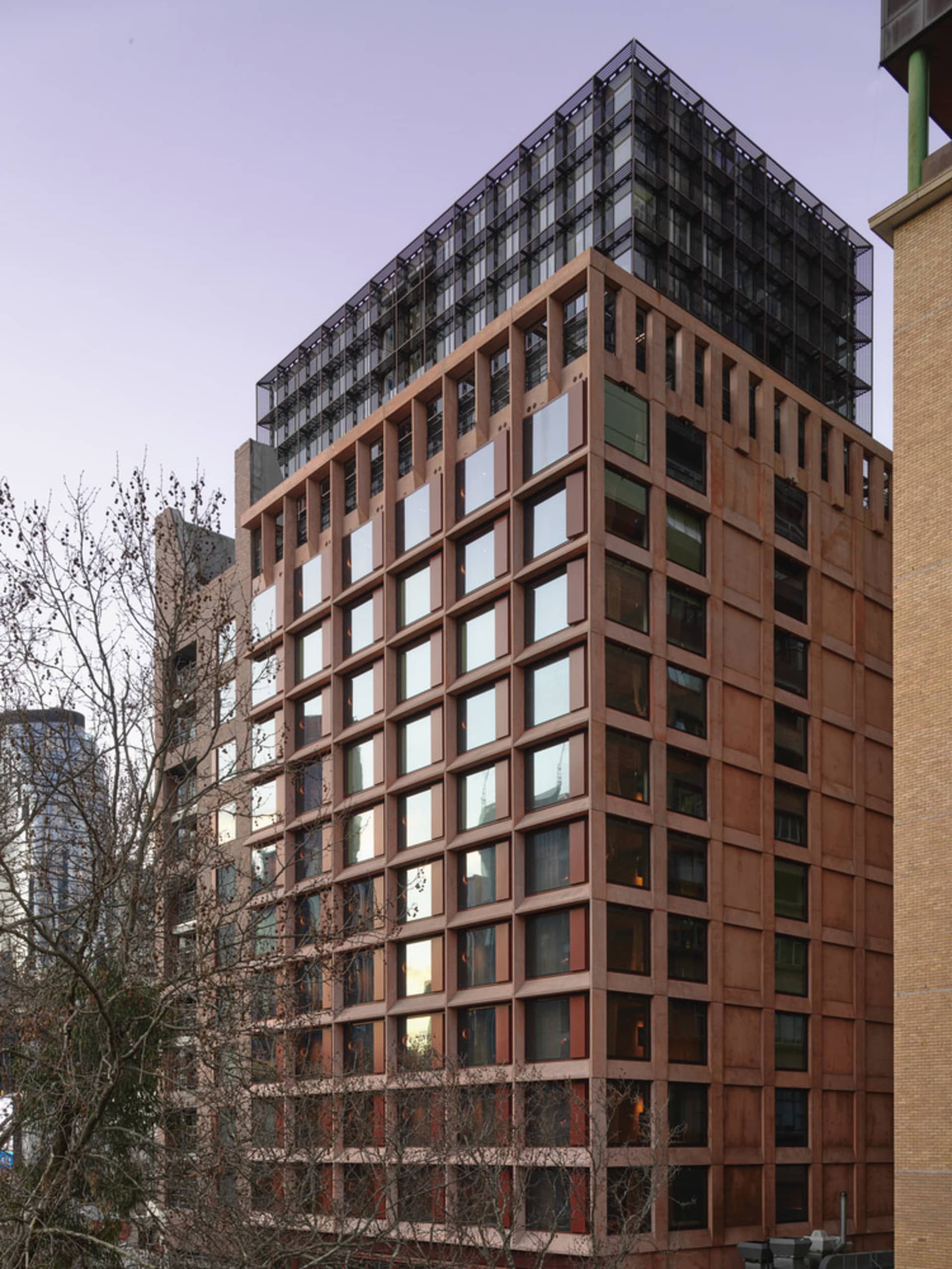 Modern building with concrete and glass exterior.
