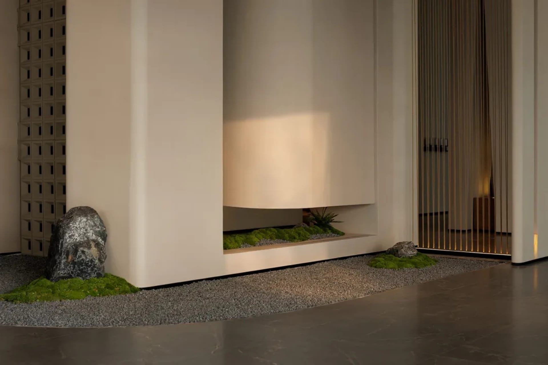 A minimalist modern interior with a concrete floor and dual-tone material design.