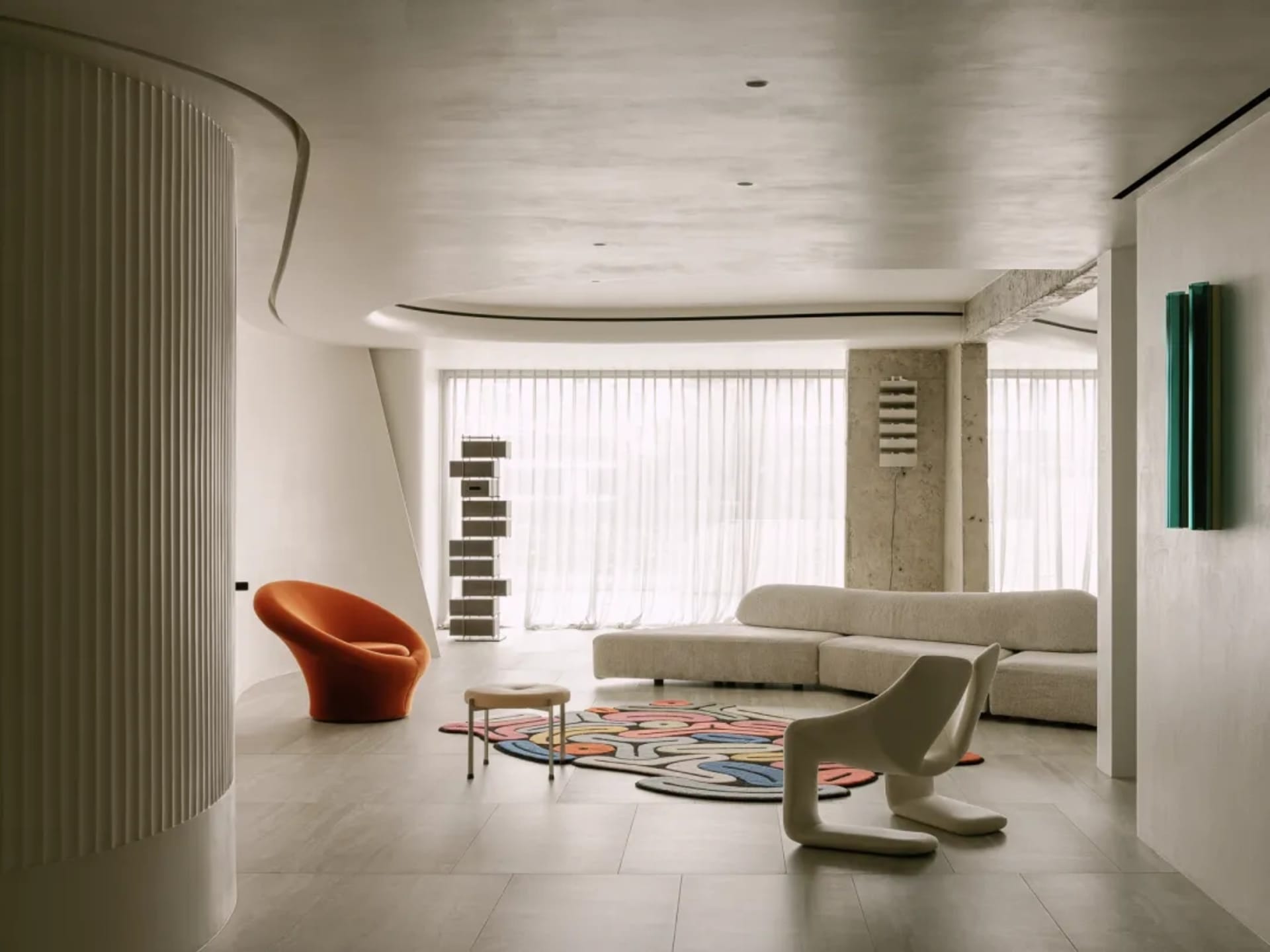 Modern living room with concrete, wood, fabric, and metal materials and minimalist design