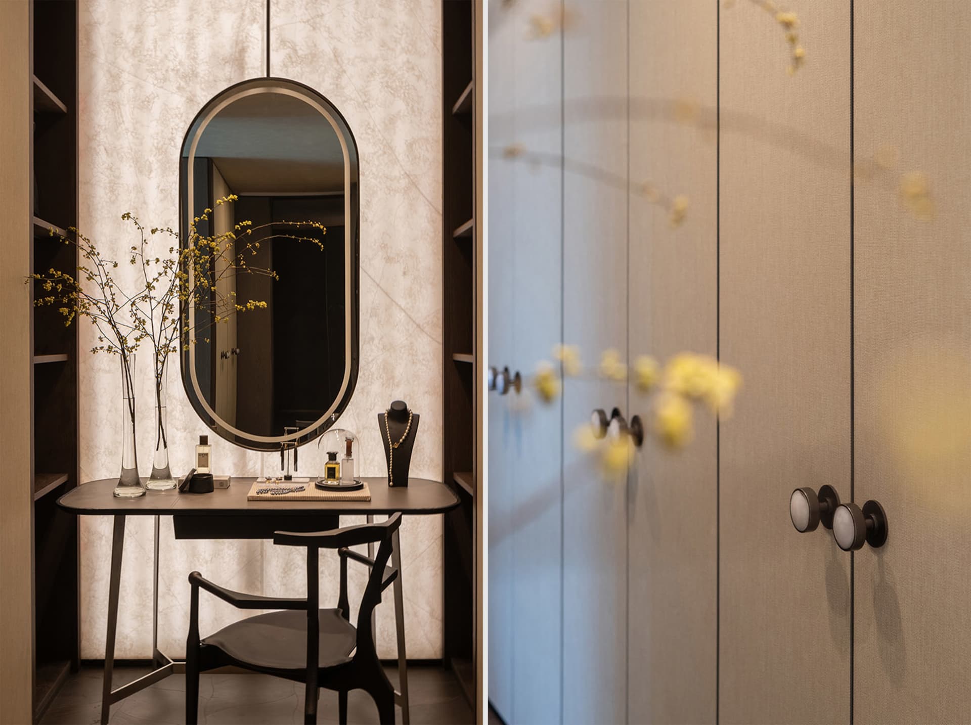 A modern closet interior featuring a fabric-covered wardrobe, a vanity table, and decorative elements such as a vase with yel
