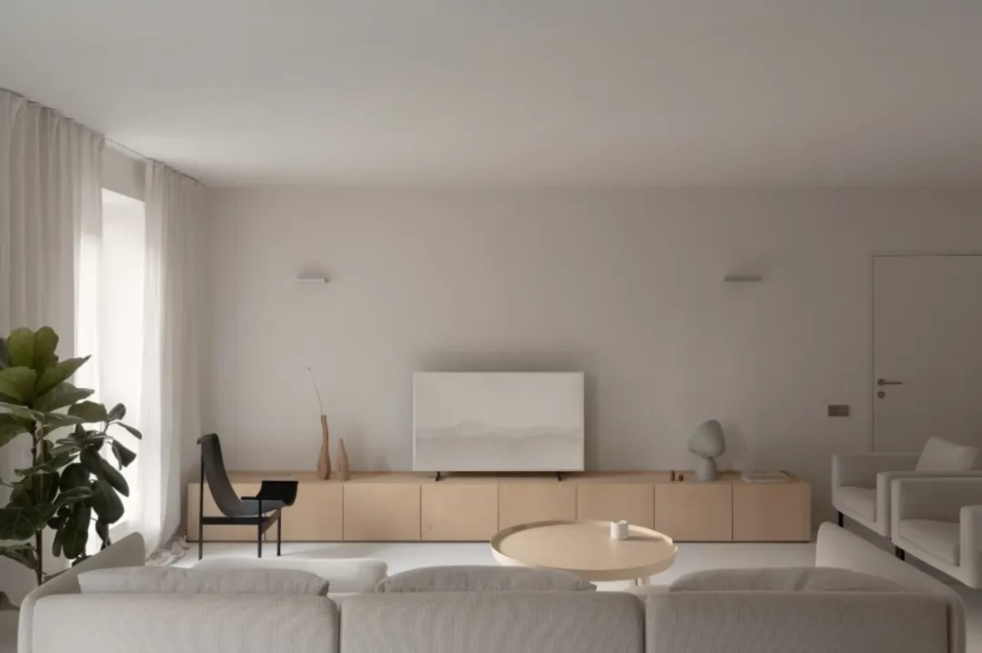 Modern minimalist living room featuring wood furniture, white walls, and a round coffee table.