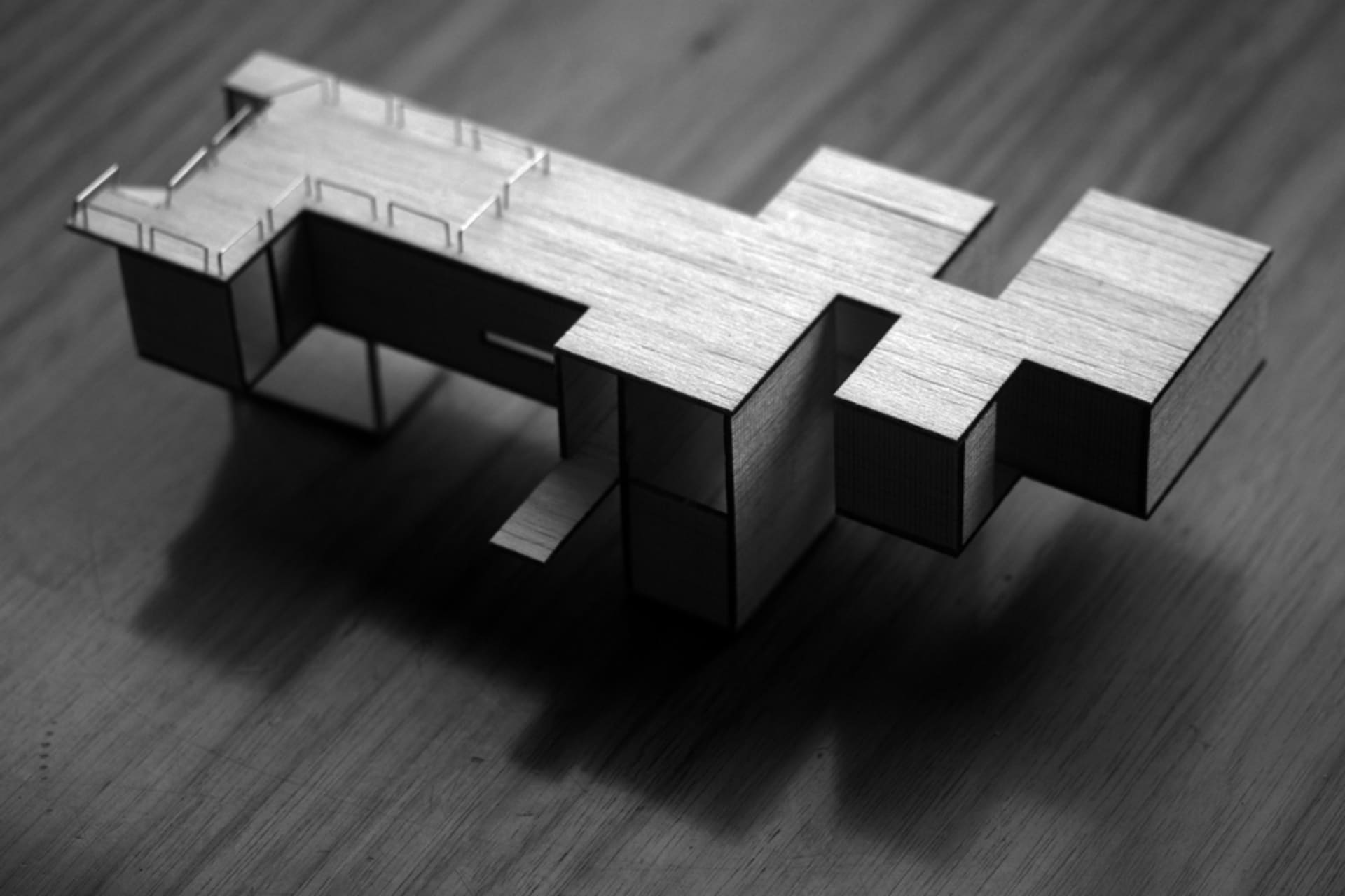 A modern residential house rendered in wood material