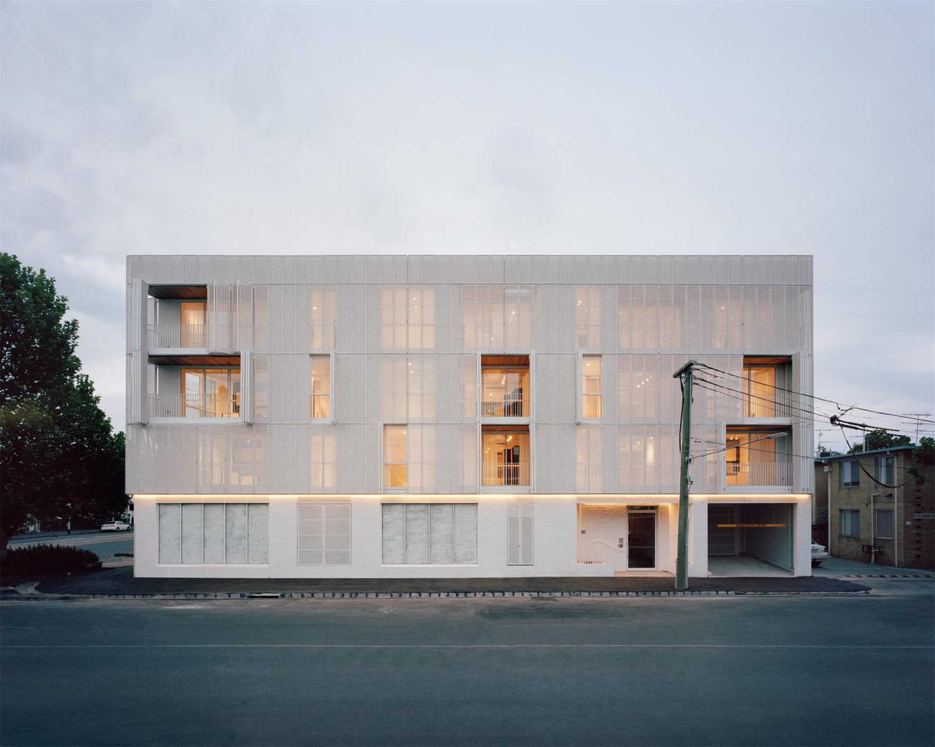 Modern building facade featuring metal perforated panels
