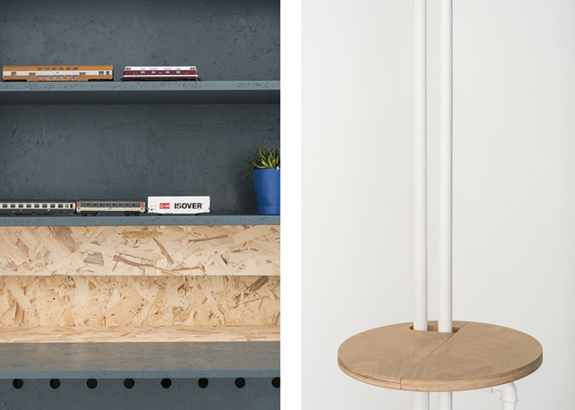 A minimalist interior design featuring a wood shelf with a blue plant pot and model trains.