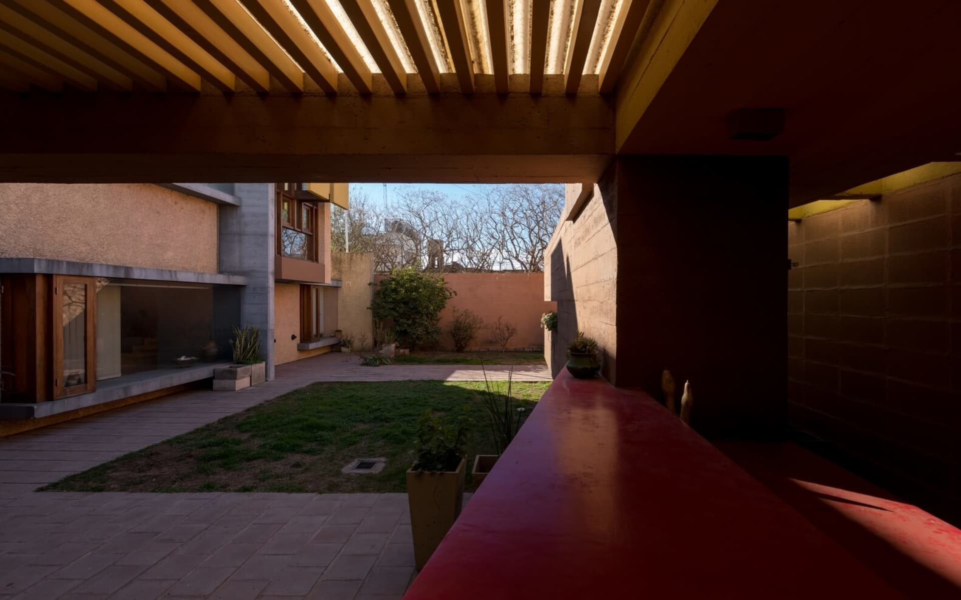 A modern interior space featuring concrete materials