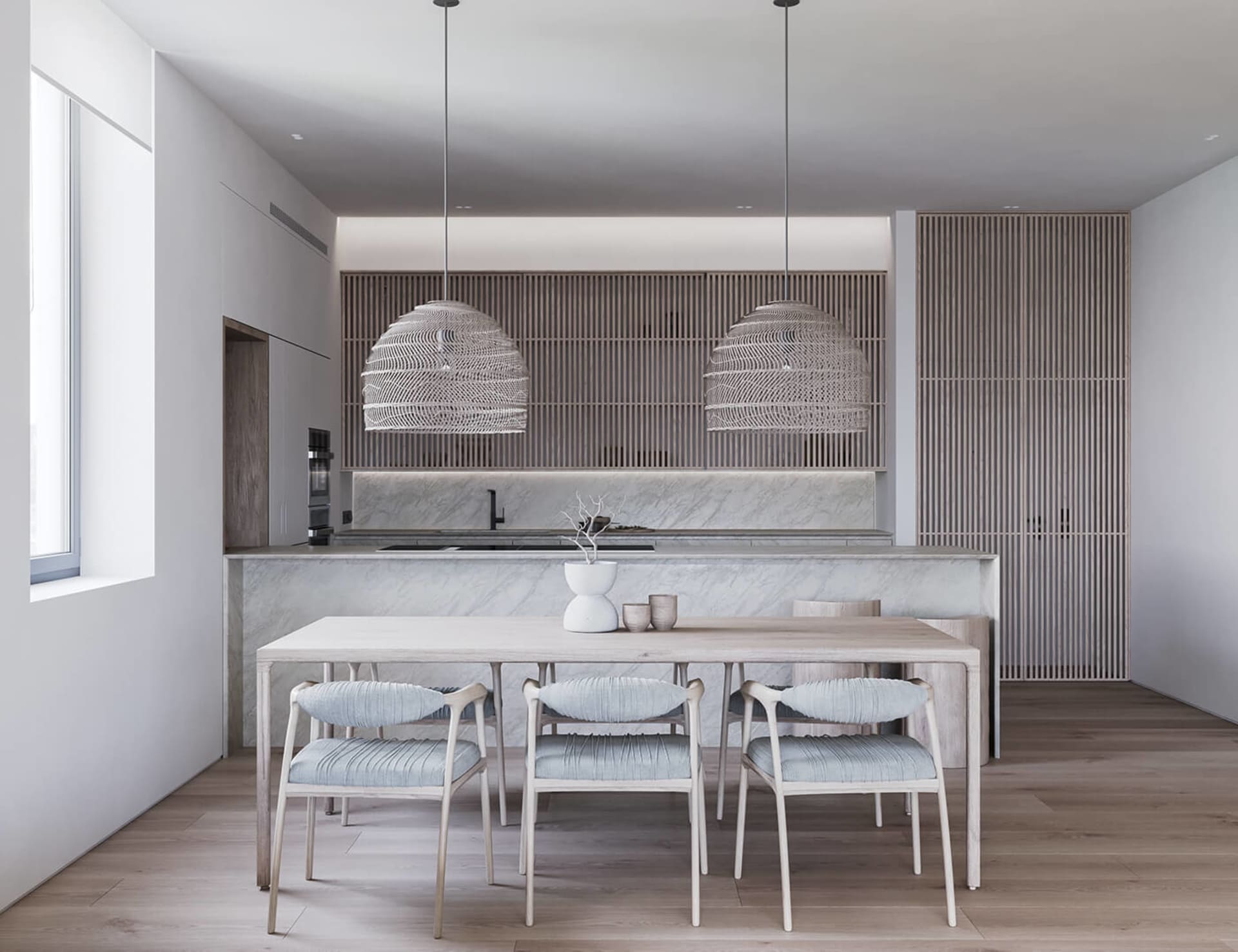 Minimalist kitchen and dining space with marble accents and wooden furniture.