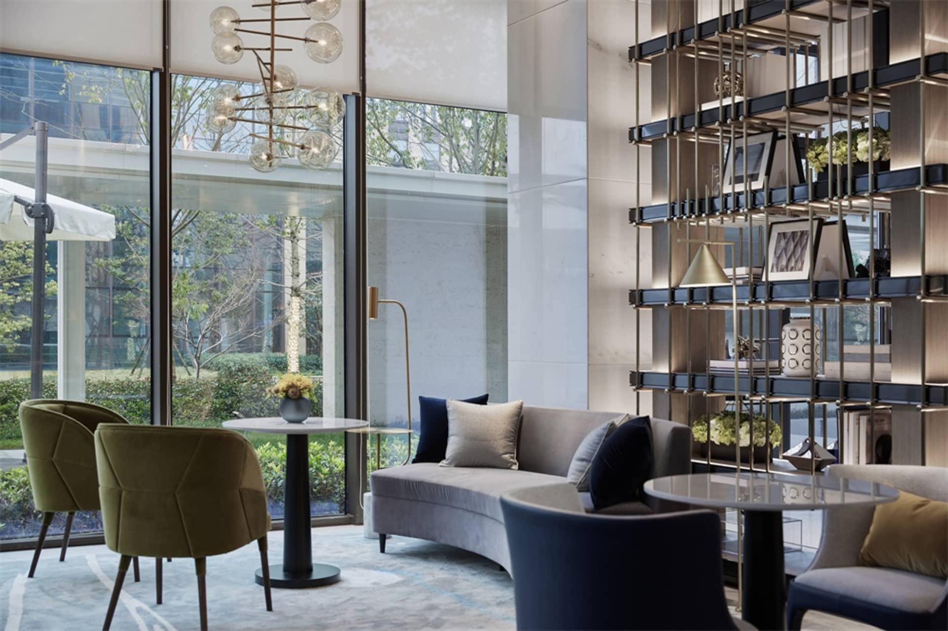 Modern lobby with luxurious marble flooring, comfortable seating, and contemporary design elements