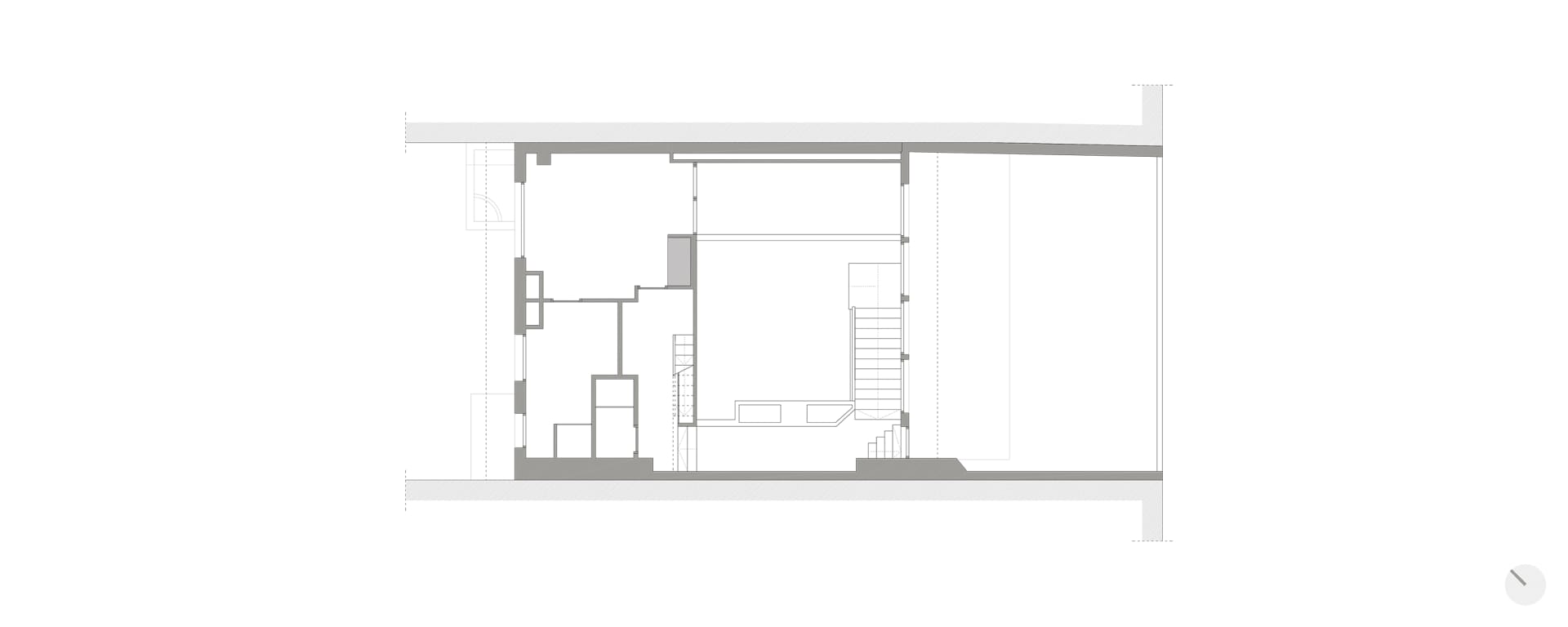 Modern interior floor plan featuring concrete and wood elements.