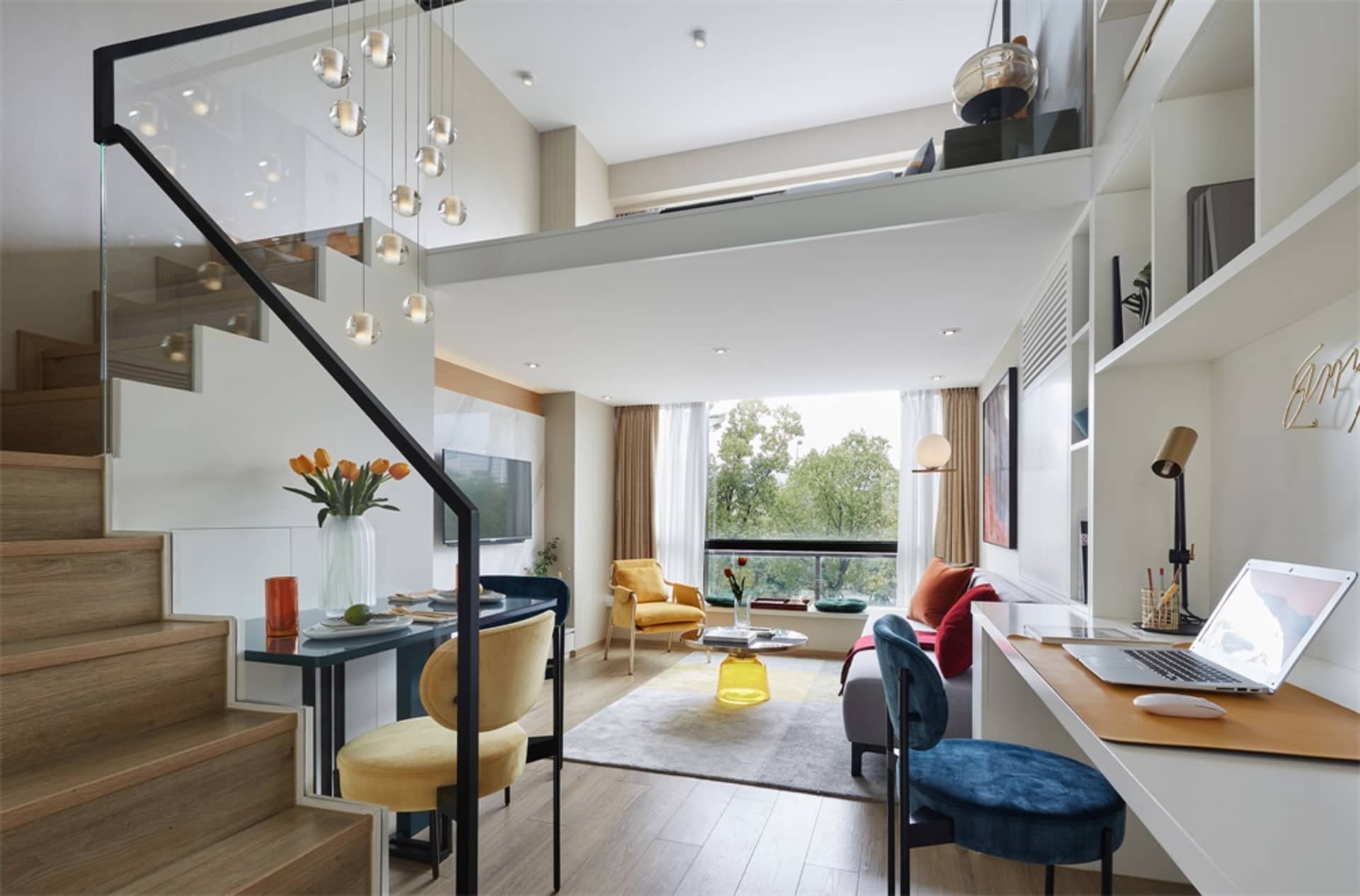 A modern living room with concrete flooring and furniture.