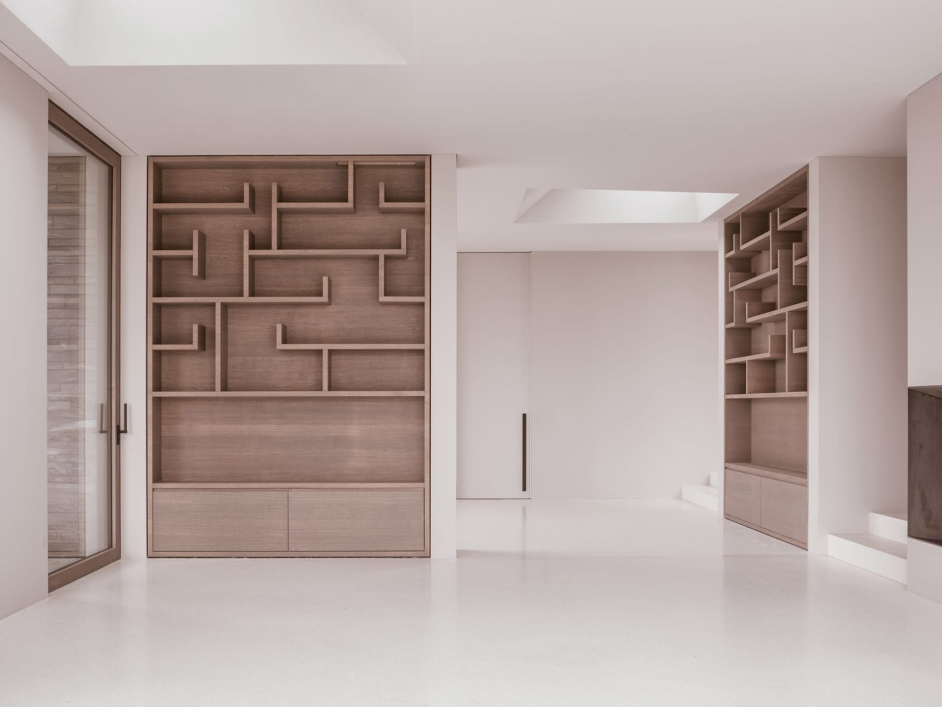 Modern interior design featuring unique wooden shelves and minimalist aesthetic.