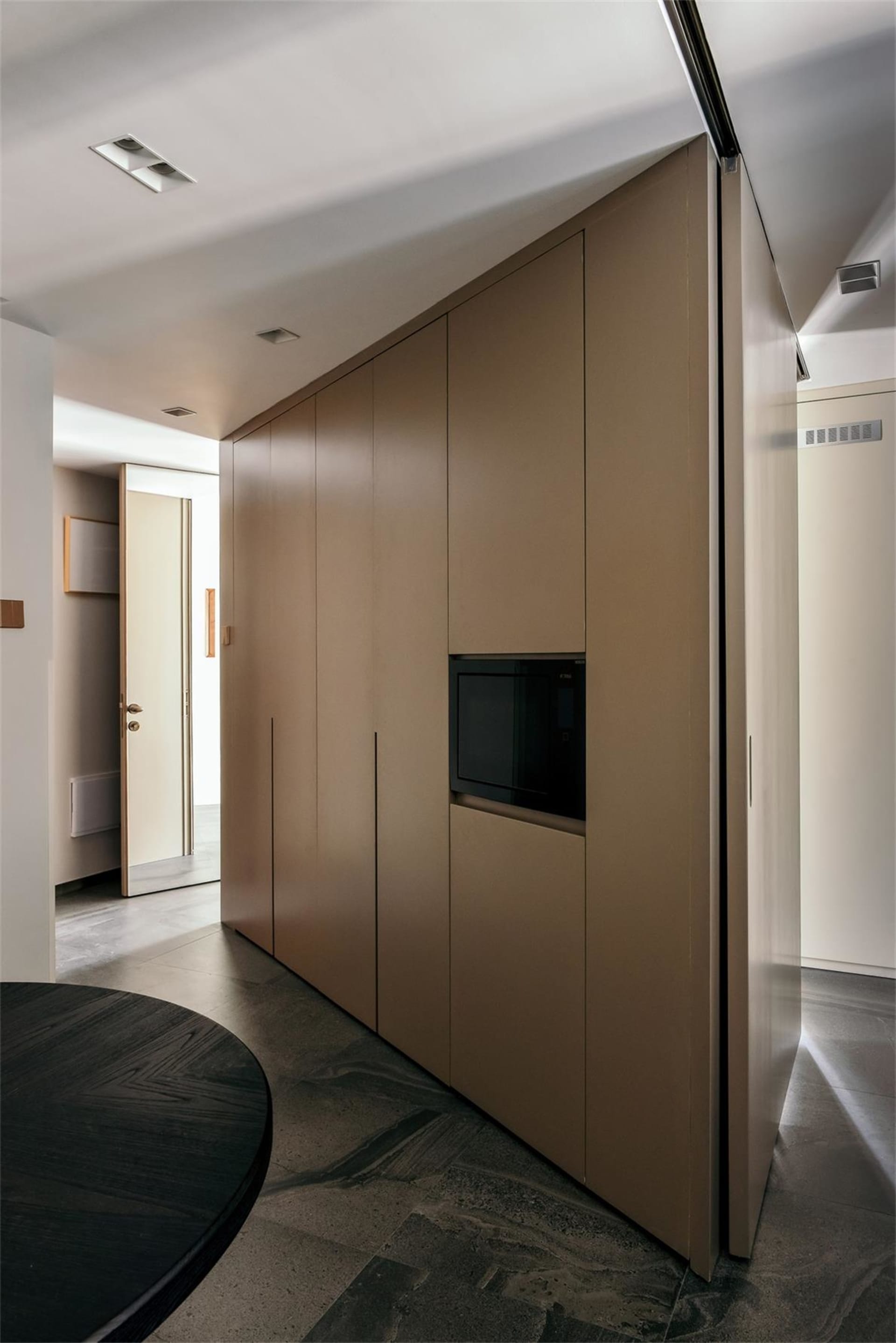 Contemporary kitchen with sleek design and armored glass