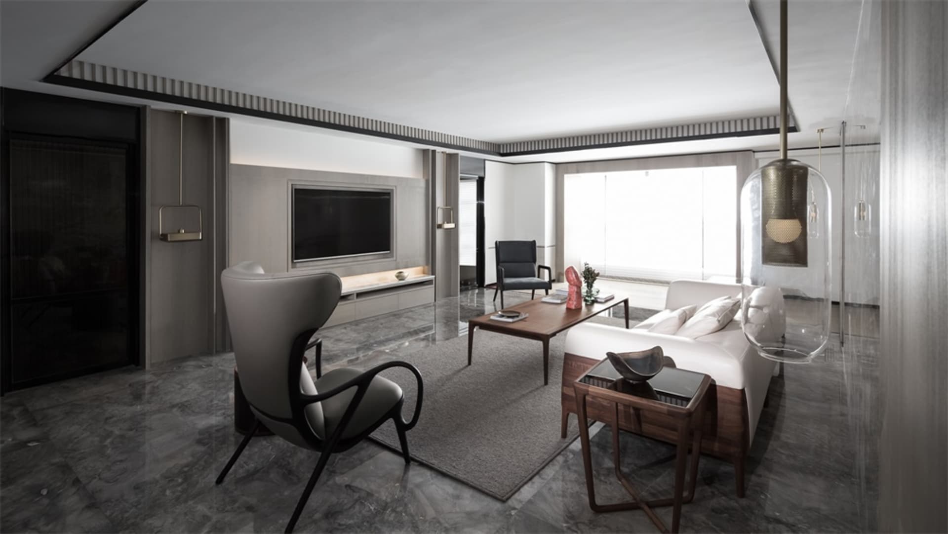 A modern living room featuring concrete and marble materials and a minimalist design.
