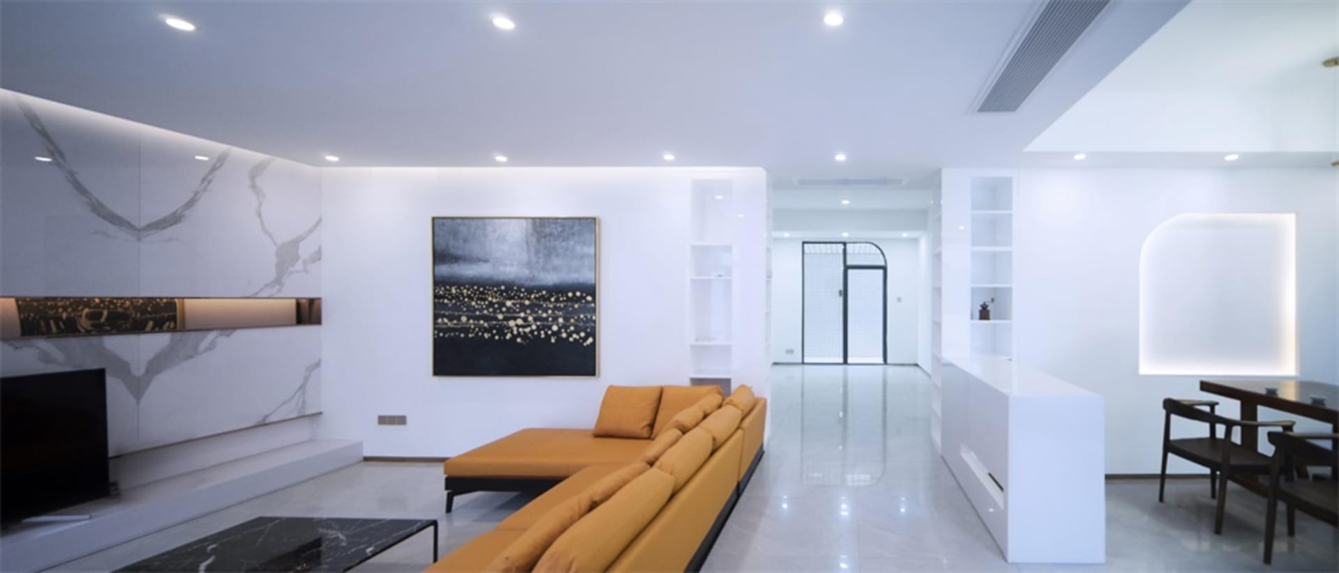 Modern minimalist living room with white marble floor, orange sectional sofa, and black coffee table.