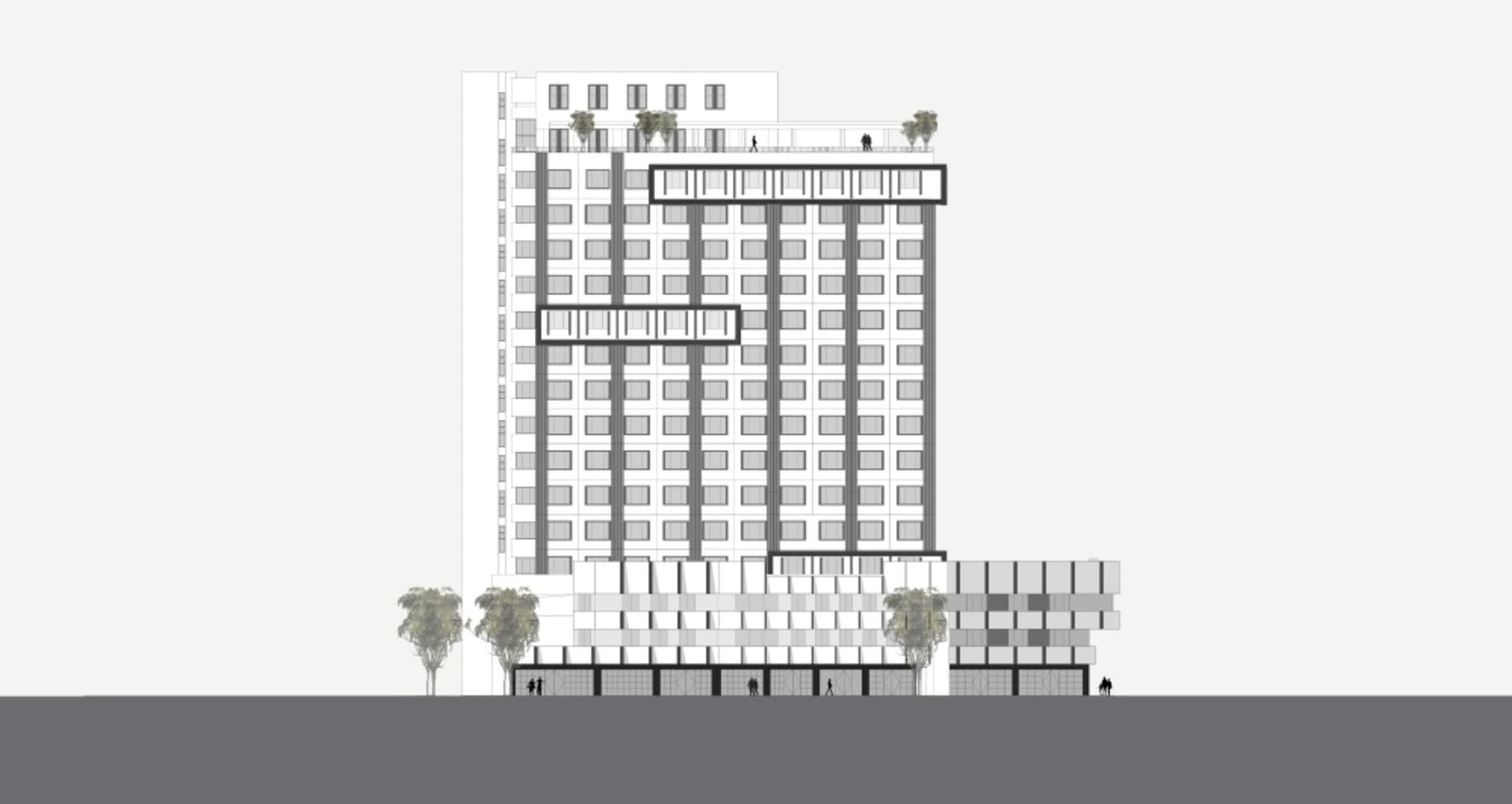 一座以玻璃、混凝土與鋼材建造的現代住宅大樓。