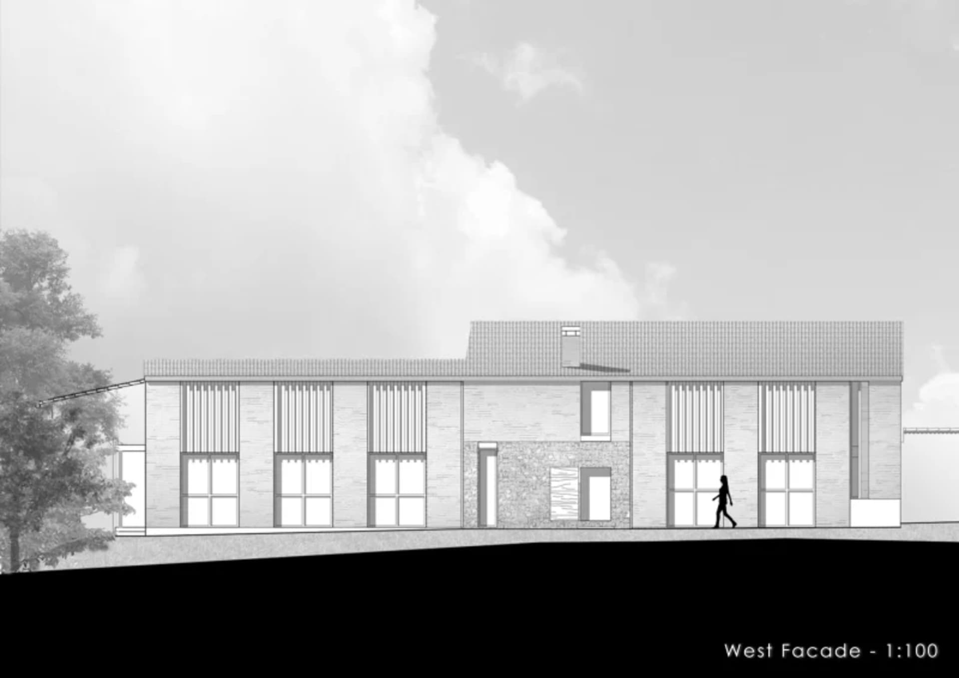 Modern building exterior made of brick with a sloping roof and large windows