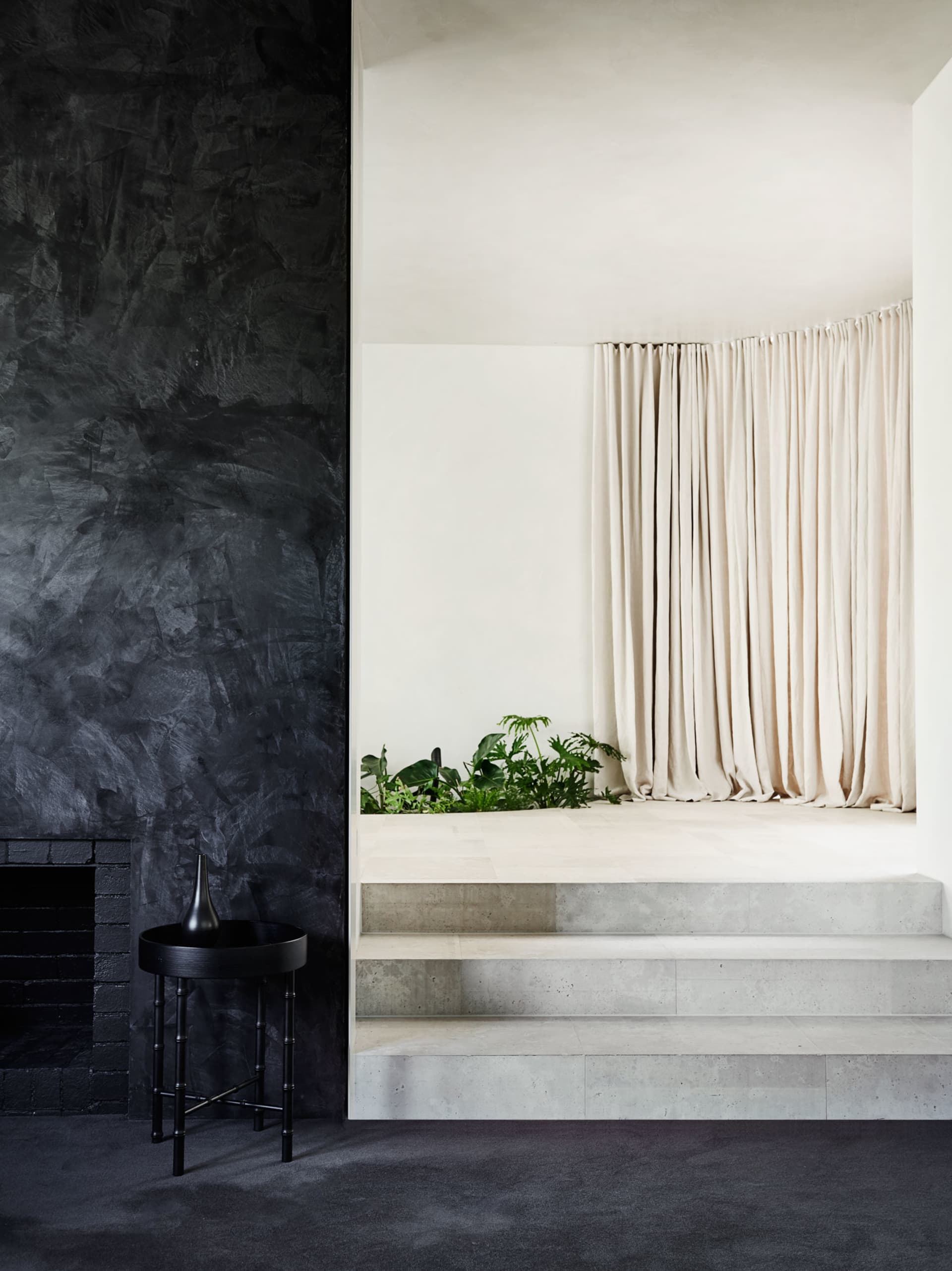 Interior design featuring modern elements like concrete and glass