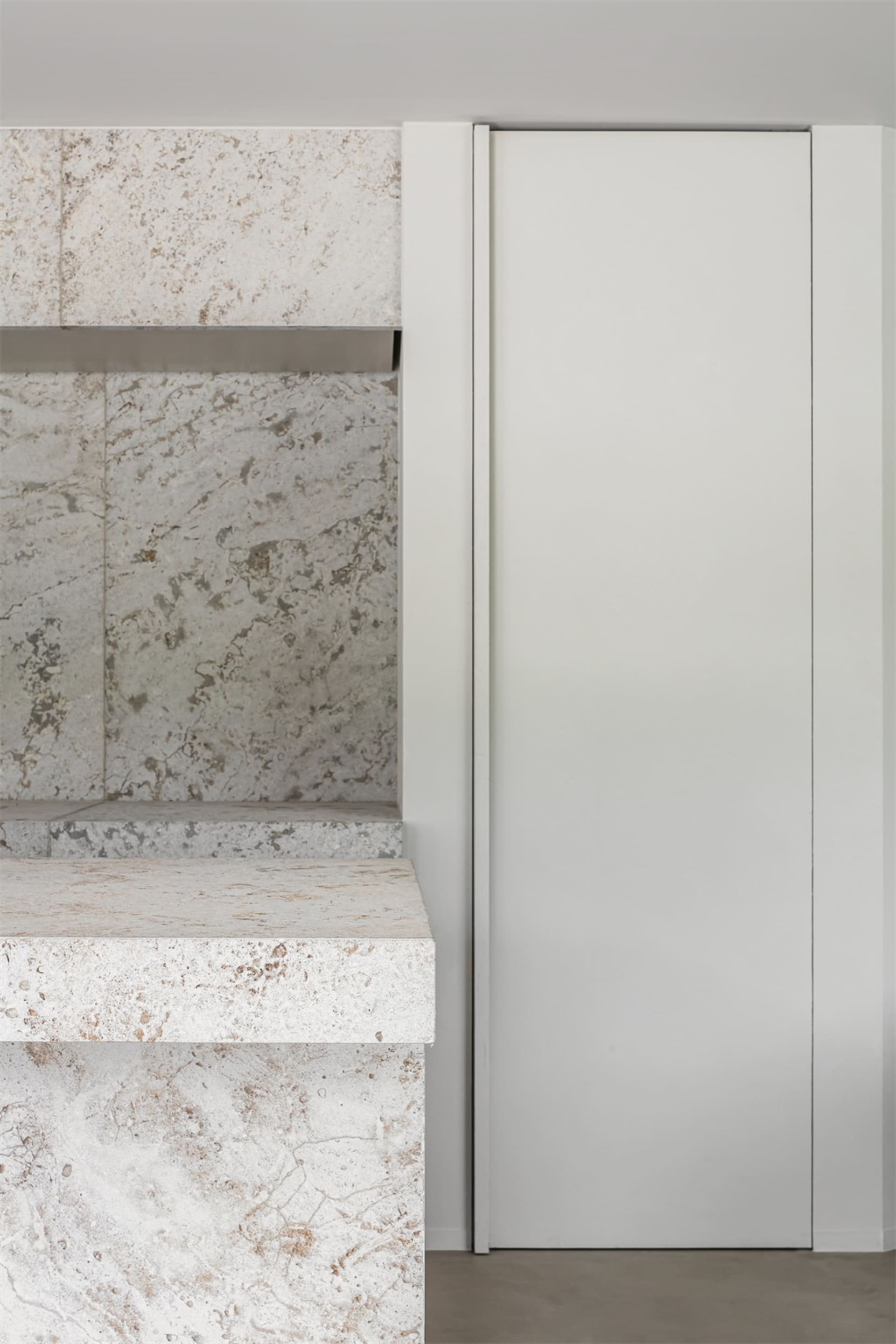 Modern interior design featuring marble finishes and clean lines