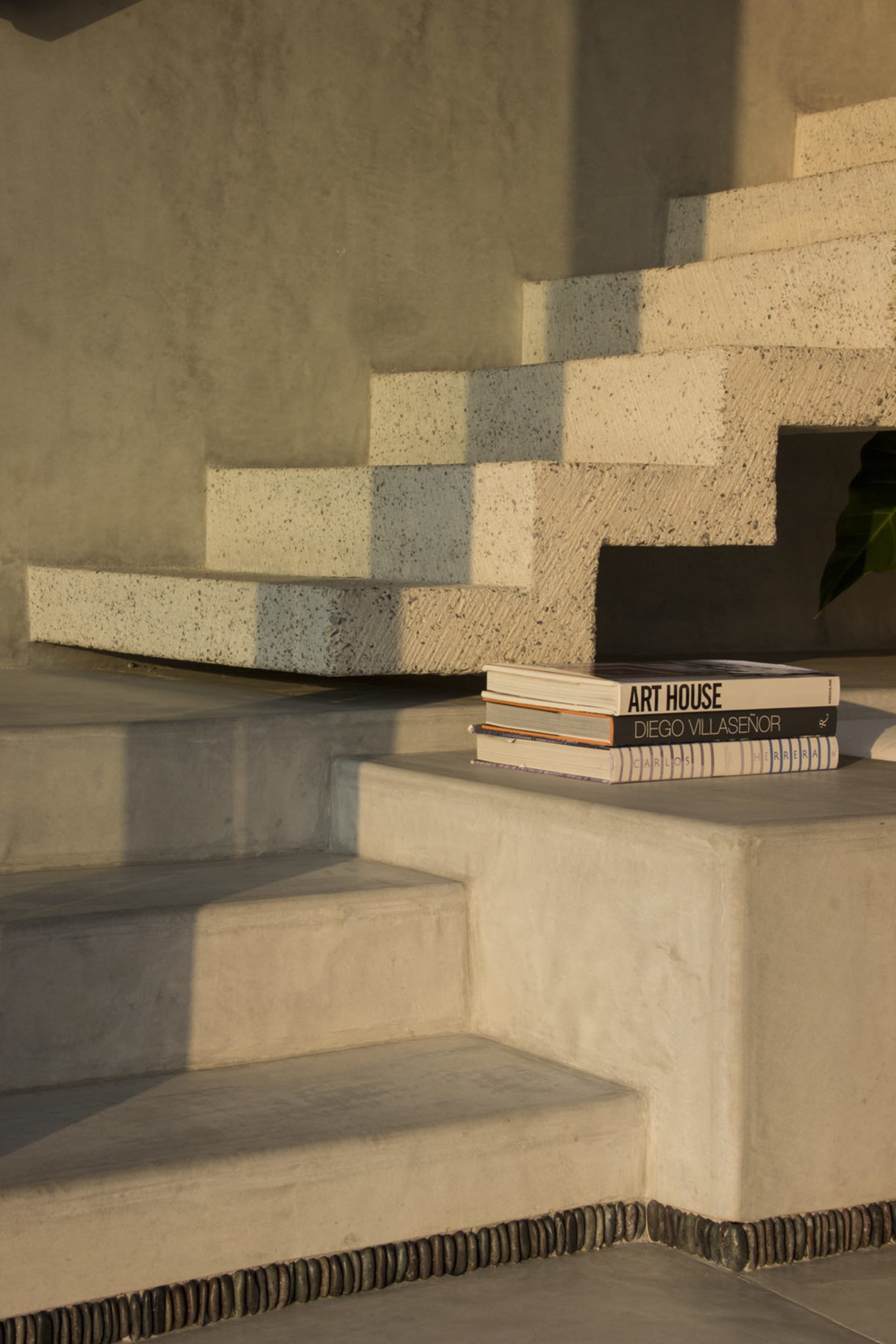 Modern staircase made of concrete and stone.