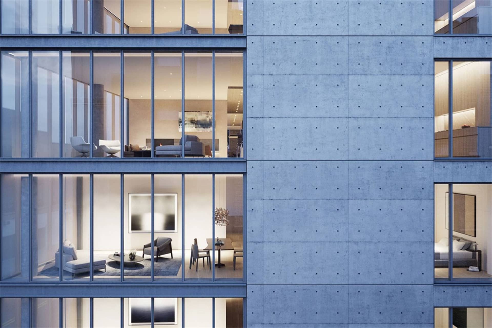 現代辦公室空間,混凝土牆面搭配大型窗戶。