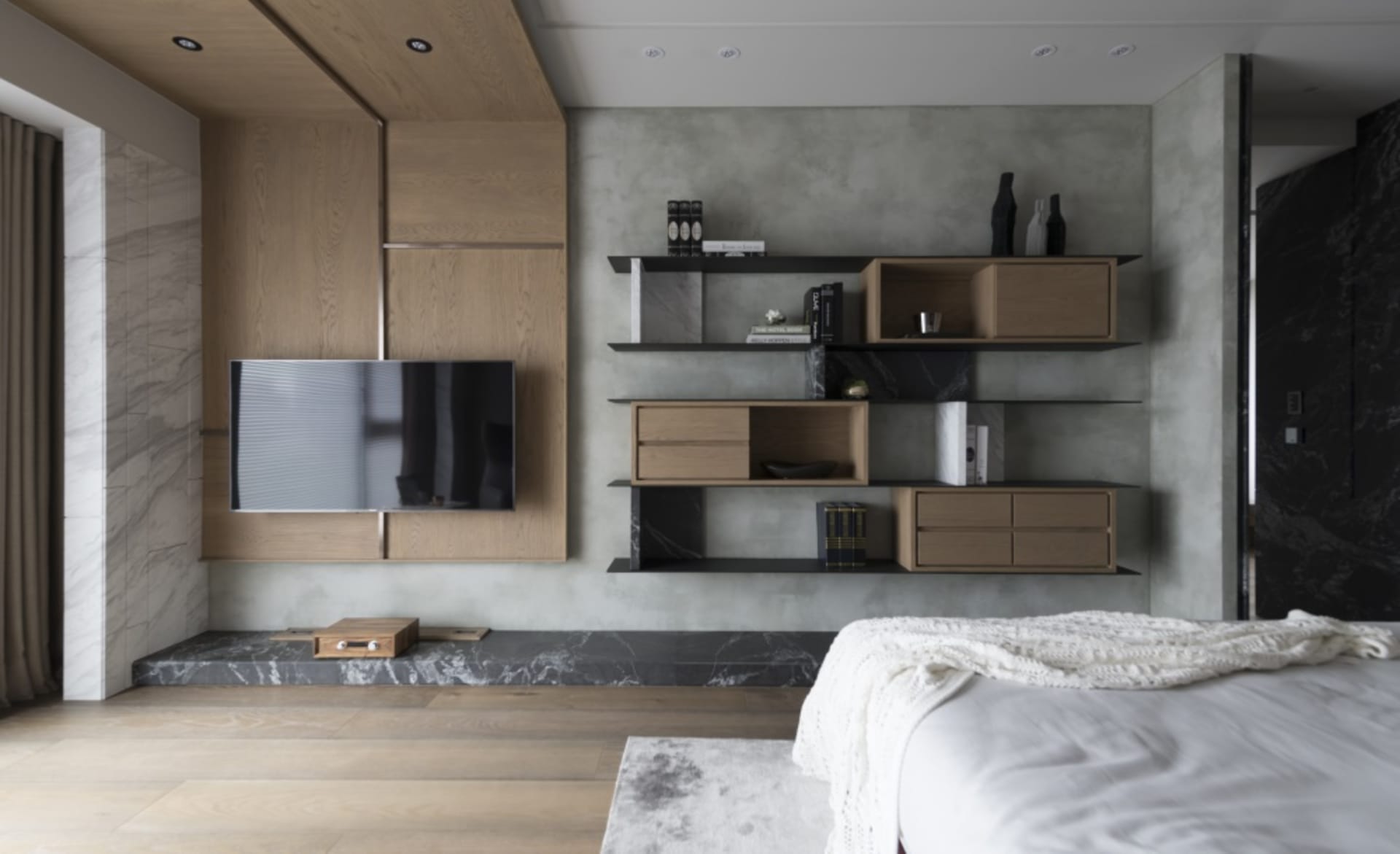A modern bedroom featuring wooden and concrete elements