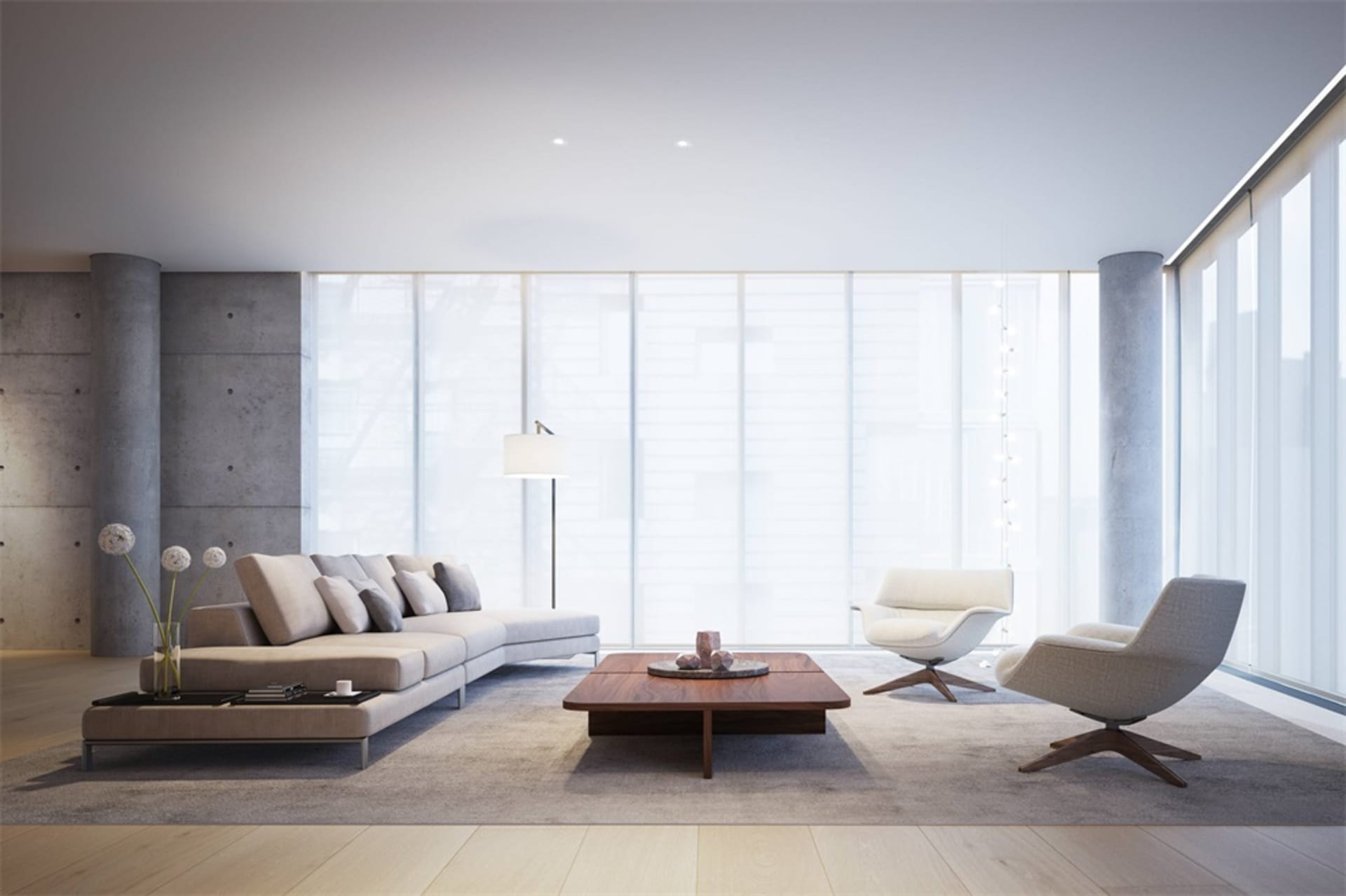 Modern living room featuring concrete, glass, and furniture.