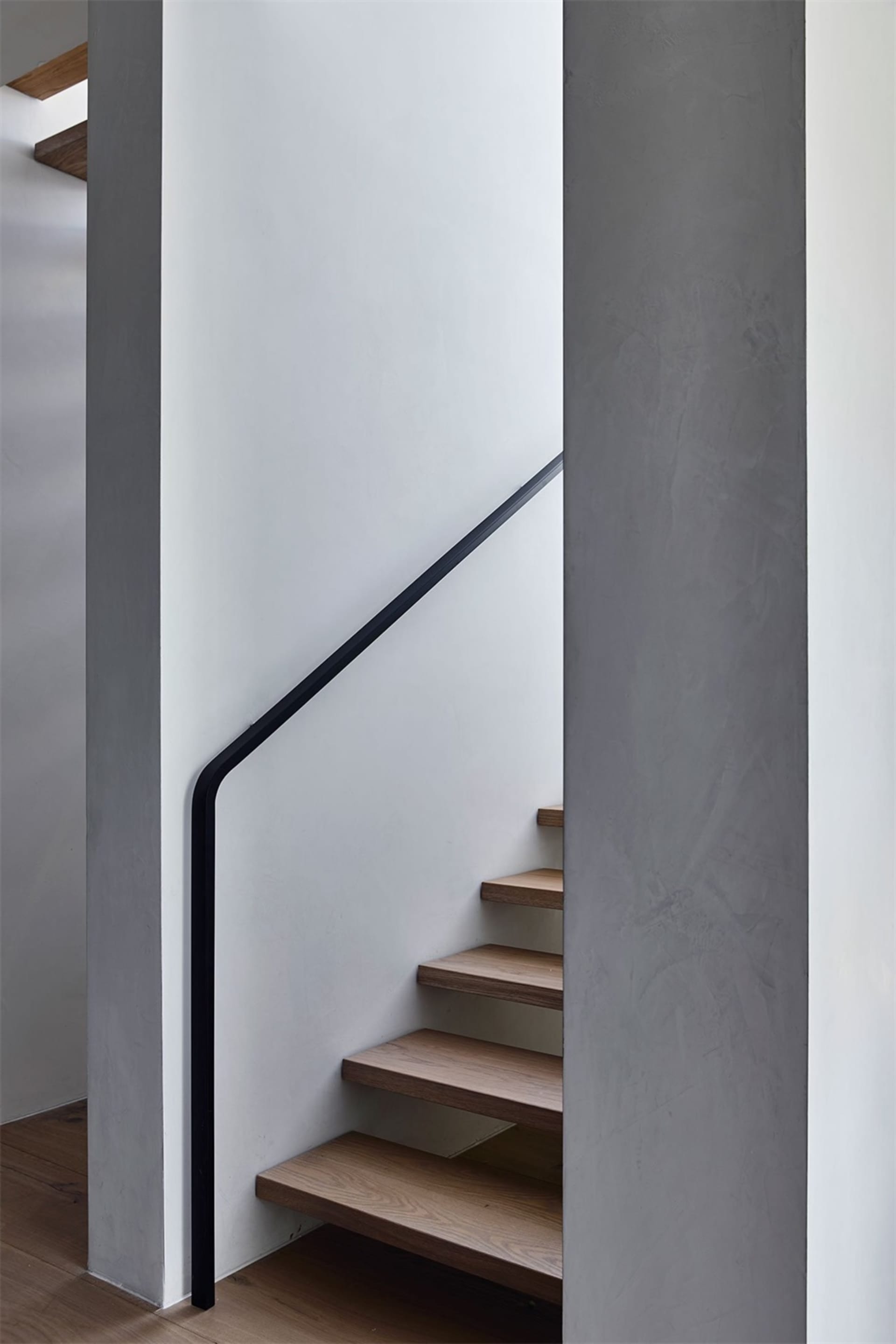 Concrete and wooden staircase with minimalist design