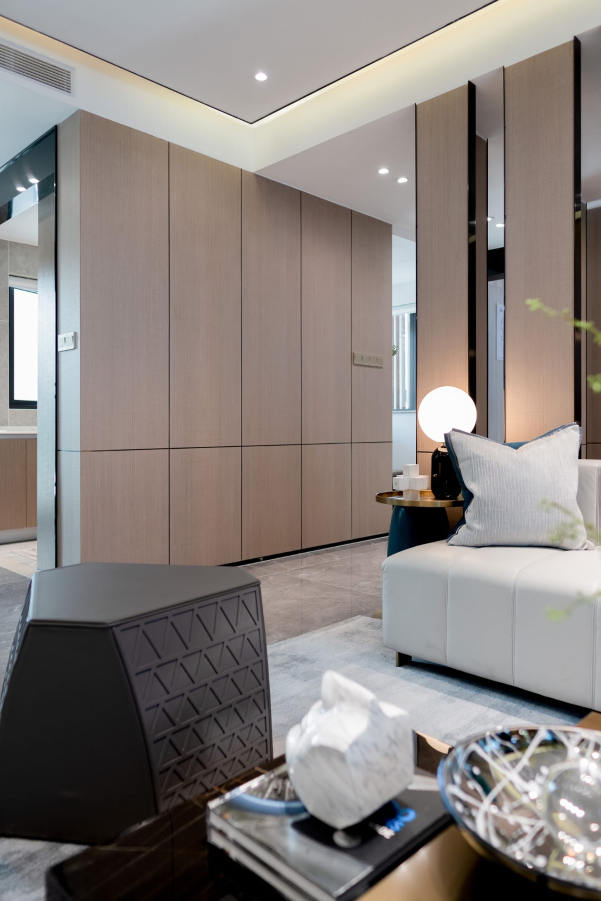 Modern living room featuring a wooden cabinet system