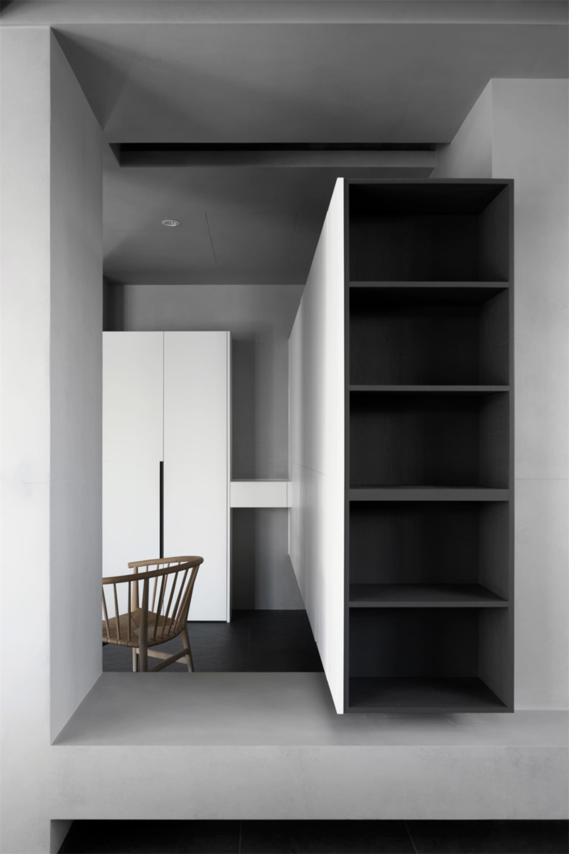 Modern interior design featuring a minimalist space with concrete walls and wooden furniture.