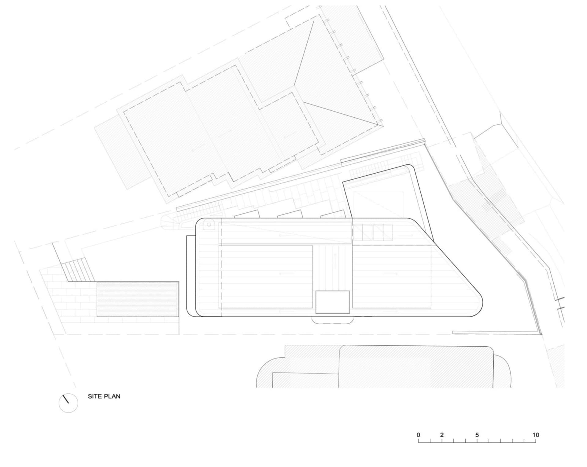 Floor plan blueprint of an office building, including rooms and layout.