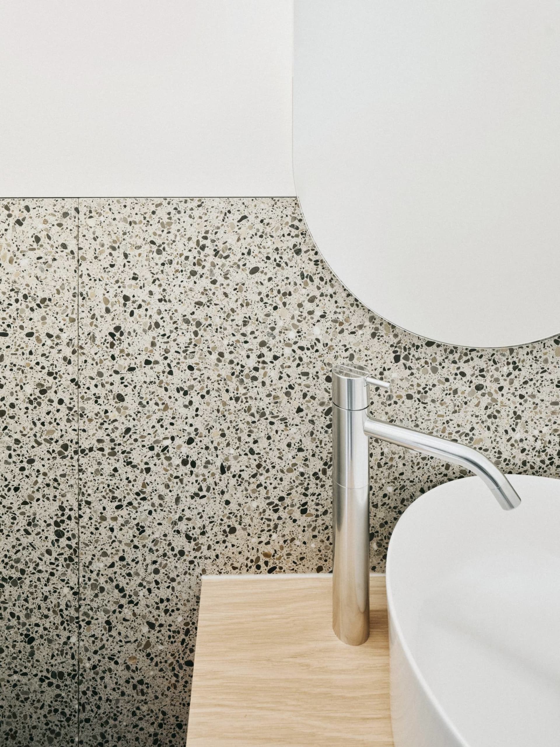 Modern bathroom featuring a terrazzo countertop design