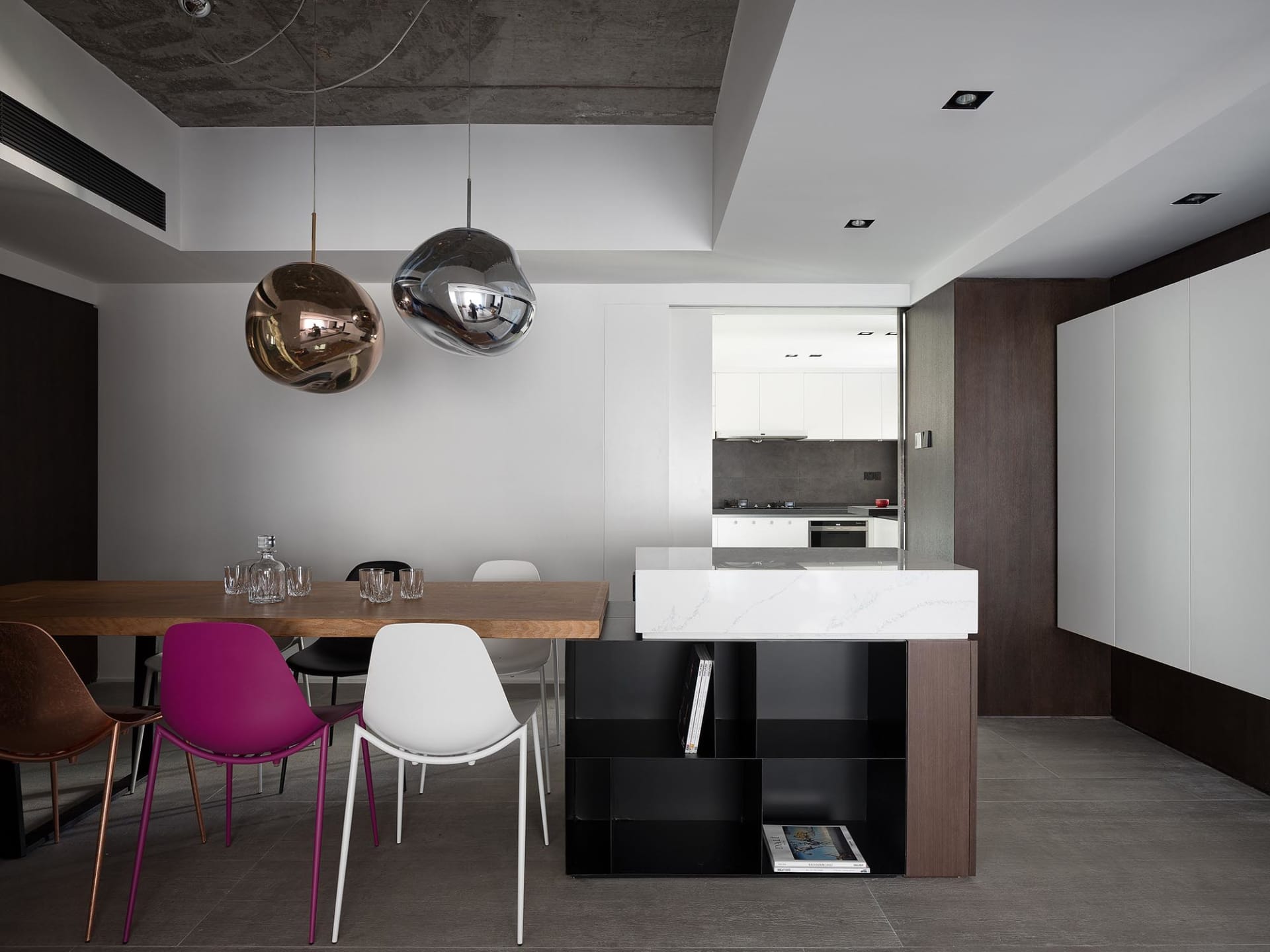 Contemporary kitchen featuring wood, glass, and marble materials.
