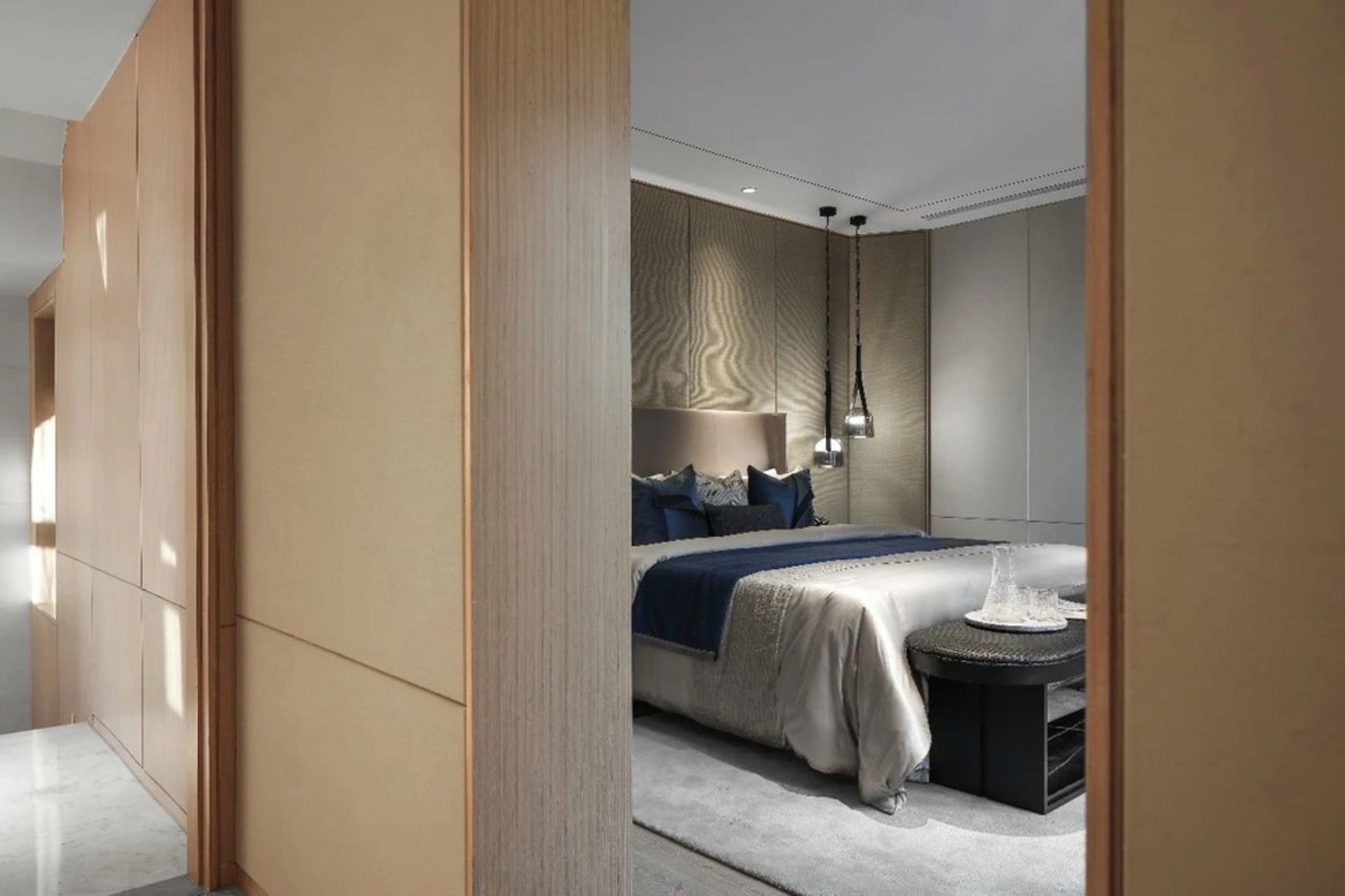 Modern minimalist bedroom featuring wood, fabric, and glass elements