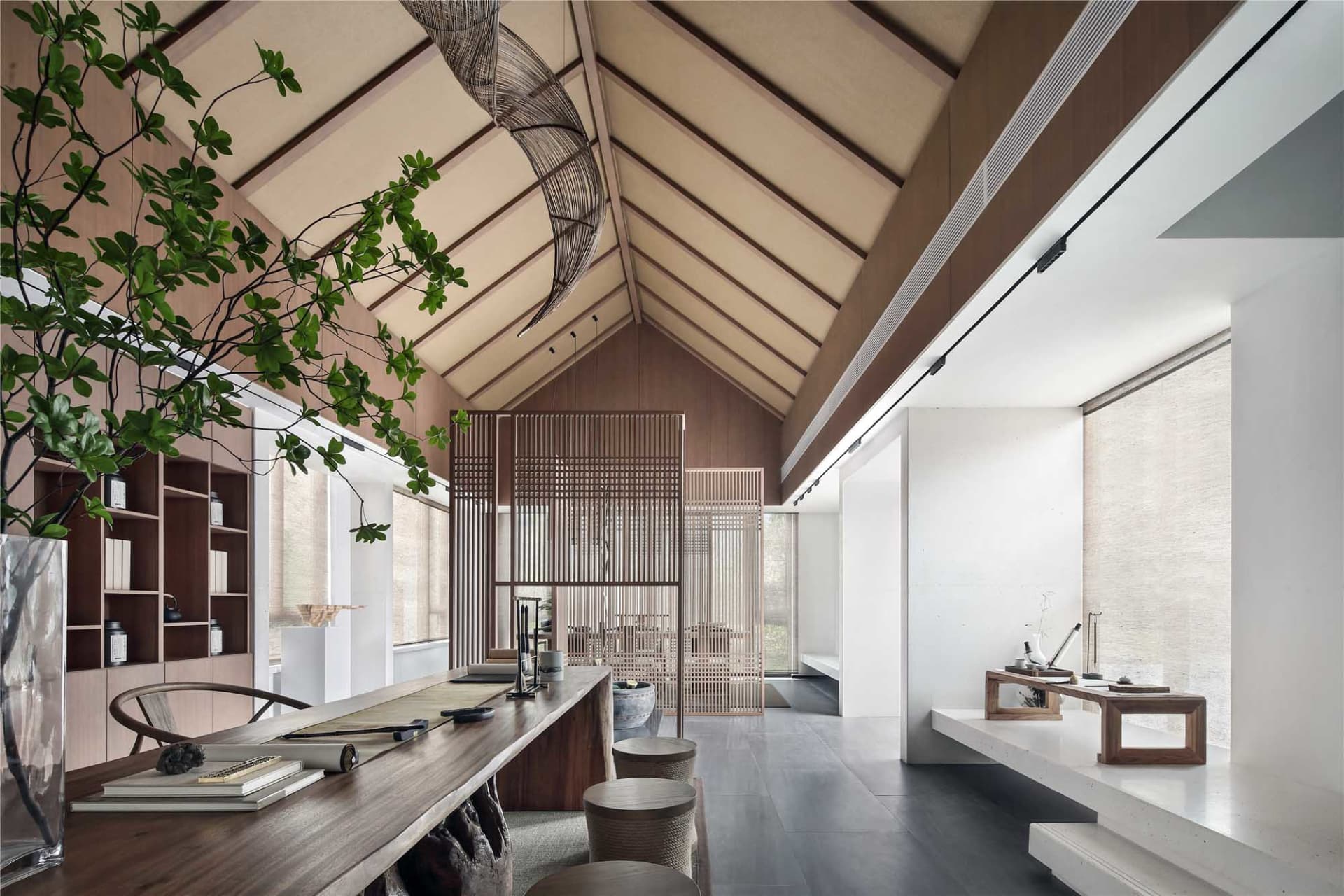 Minimalist living room featuring a combination of wood and concrete materials.