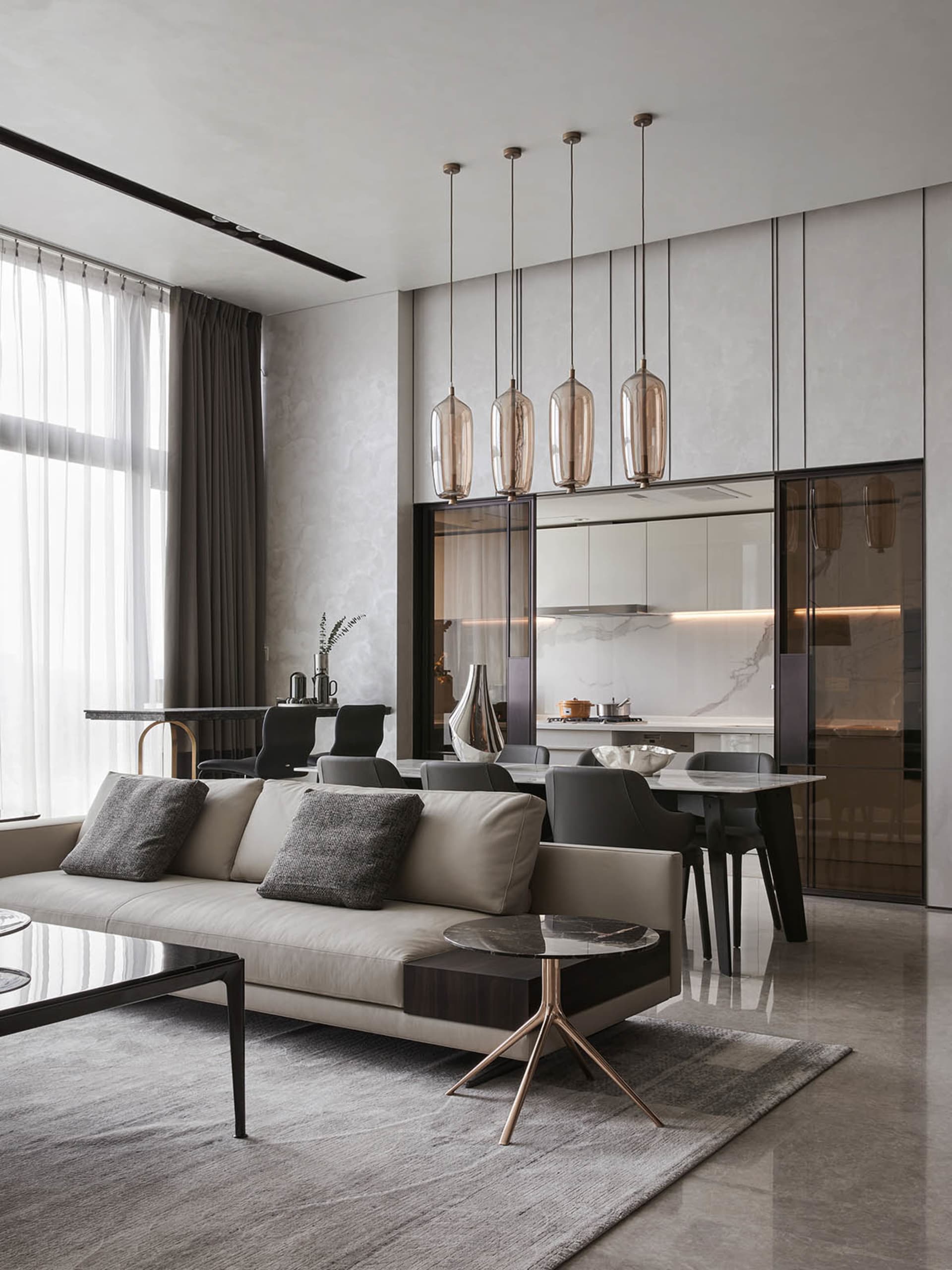 Modern minimalist living room with concrete and glass materials and furniture.