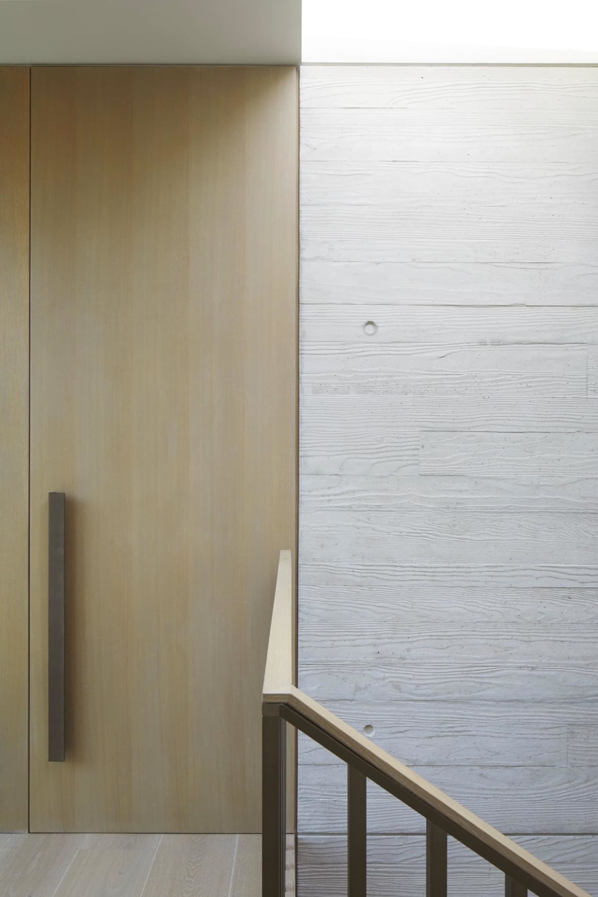 Modern staircase with concrete and wood elements