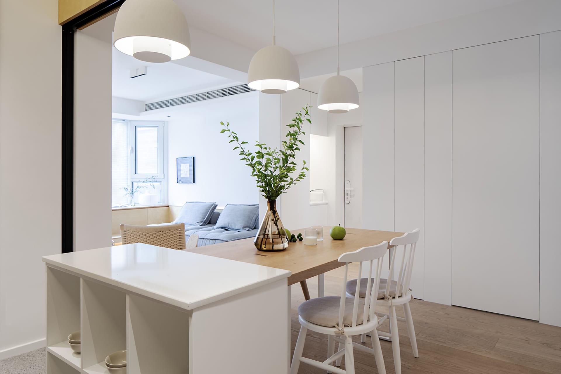 A modern kitchen with wooden elements and minimalist design