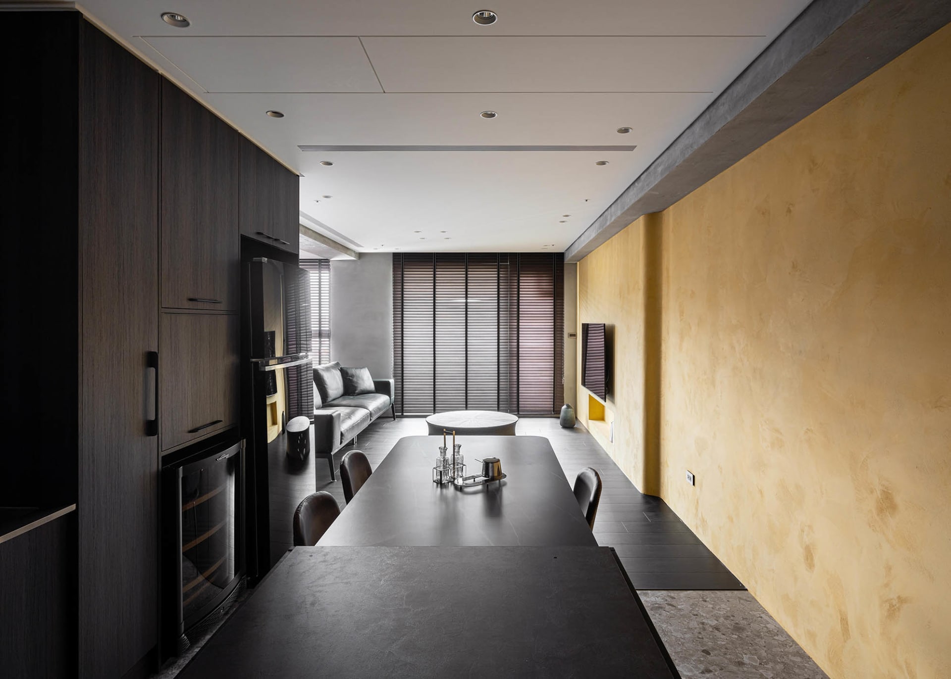 Modern dining room featuring marble finishes and sleek, contemporary design elements.