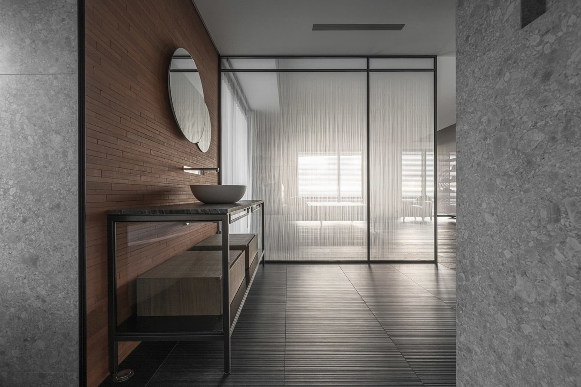 Modern bathroom with a wooden wall, a sink with a stone countertop, and glass doors leading to a frosted glass area.