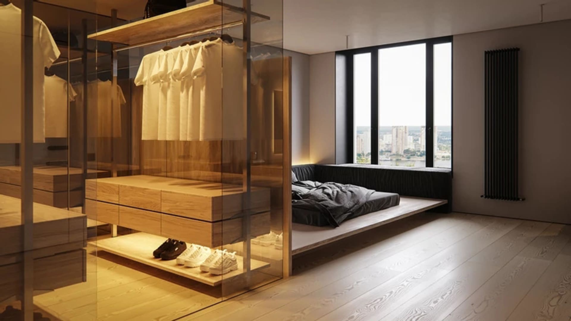A modern bedroom with grey walls, minimalist furniture, and a glass-enclosed closet.