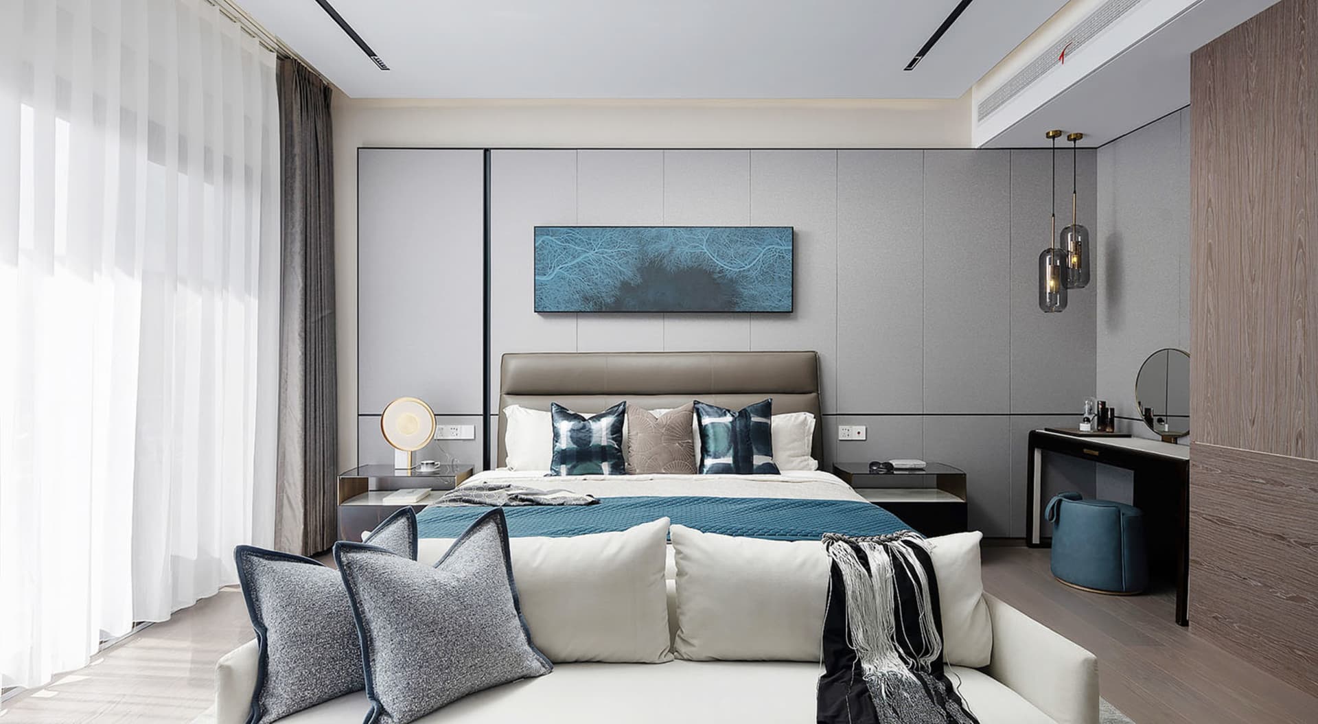 A contemporary bedroom with a bed, nightstands, and decorative pillows.