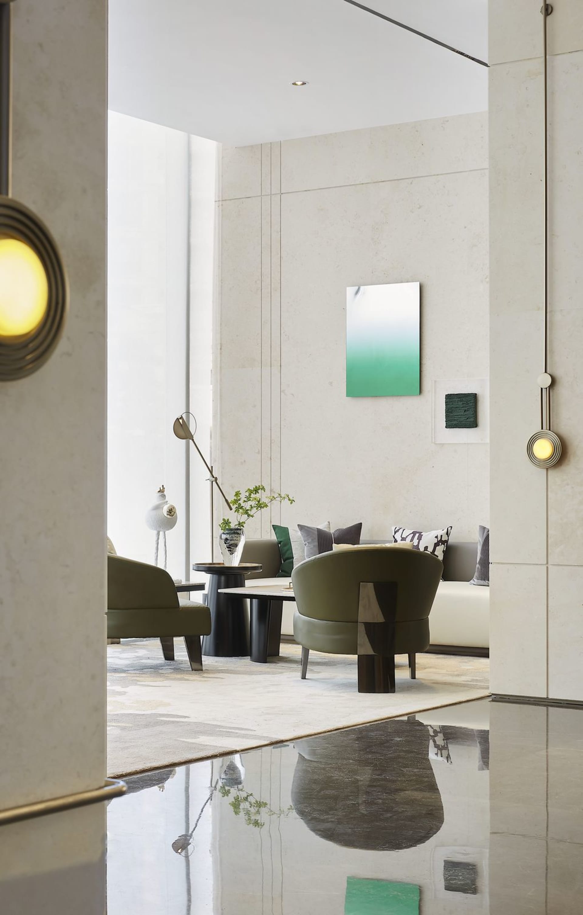 Modern living room featuring marble elements and contemporary furniture.