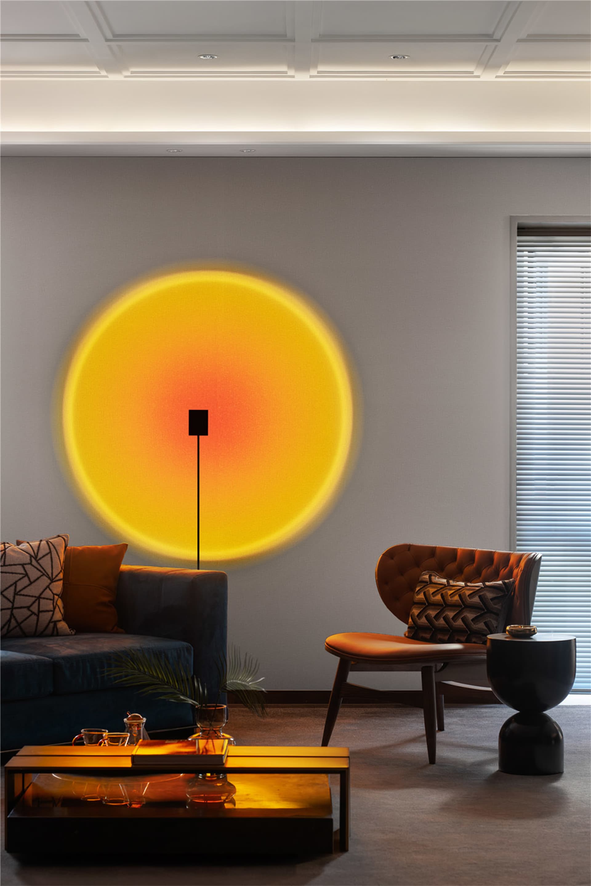 Modern living room with textured canvas wall art, featuring a cozy sofa, armchair, and coffee table.