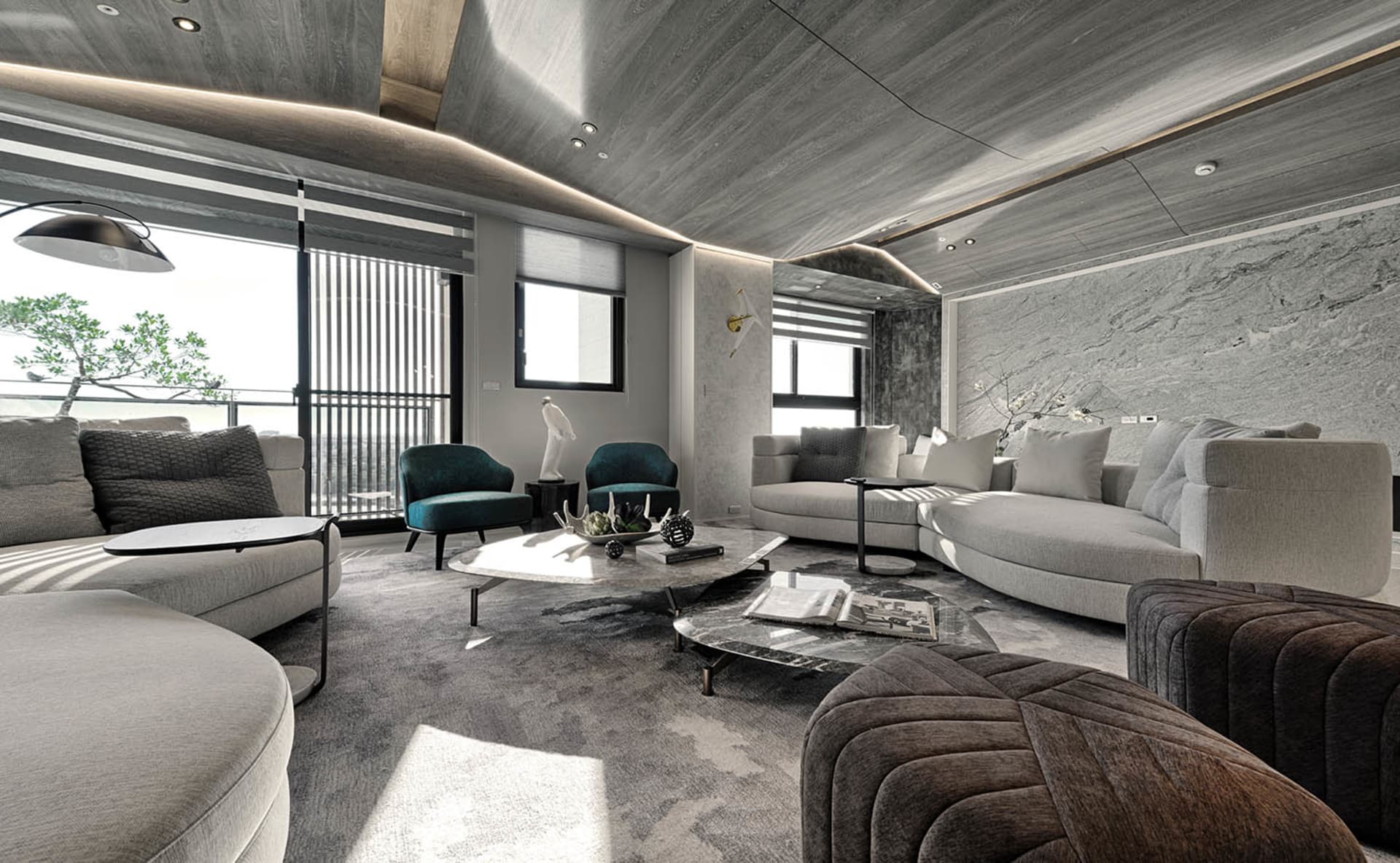 Modern living room featuring mixed materials with gray and black accents.