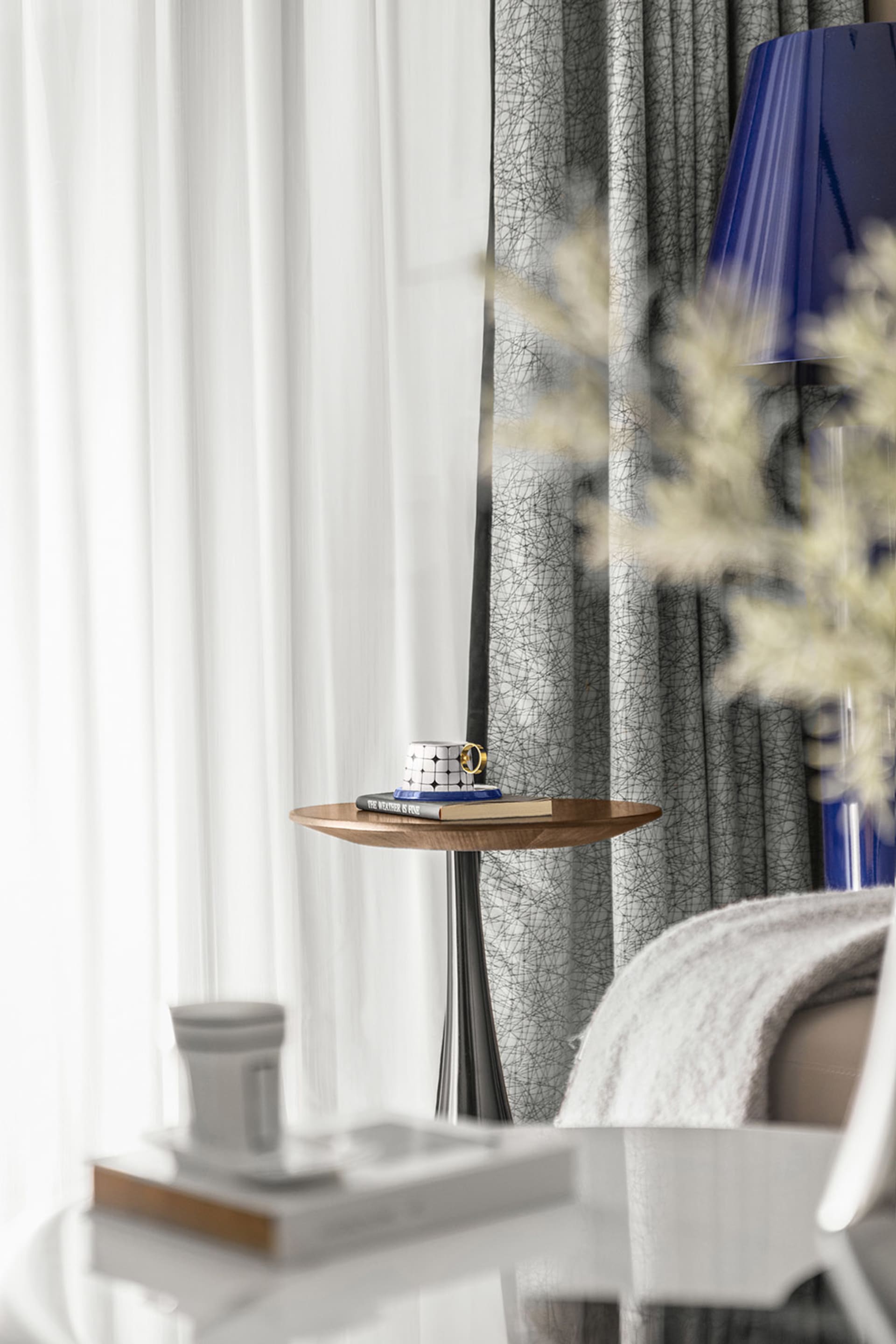 Contemporary furniture in a well-lit residential interior with minimalistic design elements.