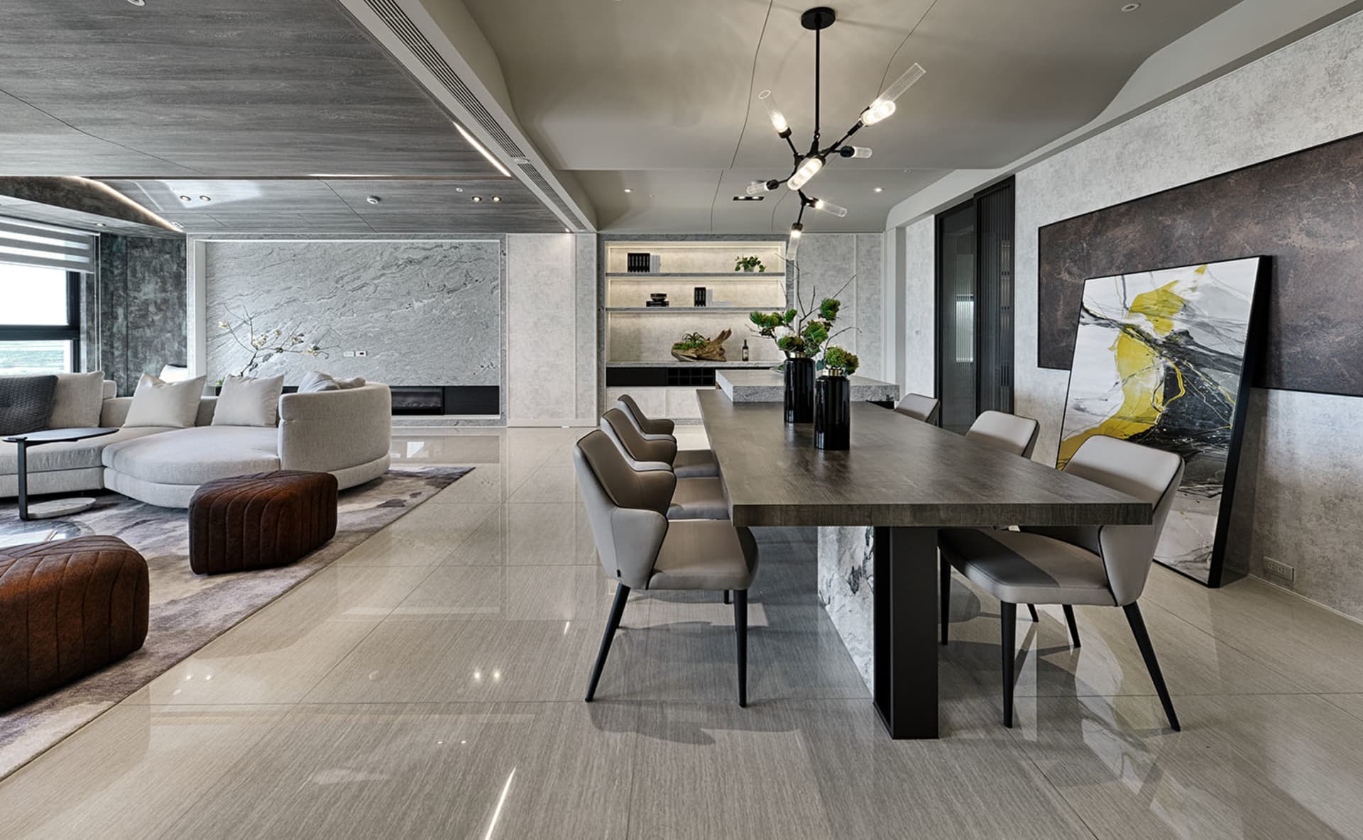 Modern residential interior featuring marble flooring and contemporary furniture