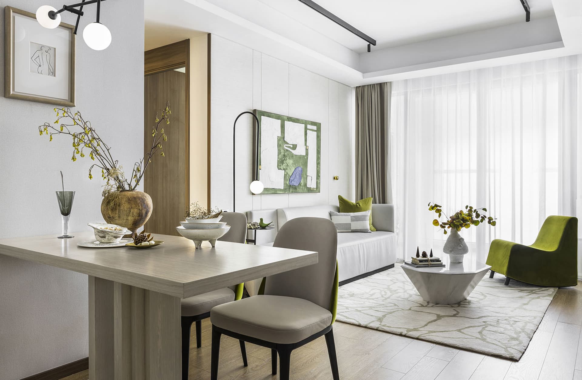 A modern living room featuring a mix of materials and light fixtures.