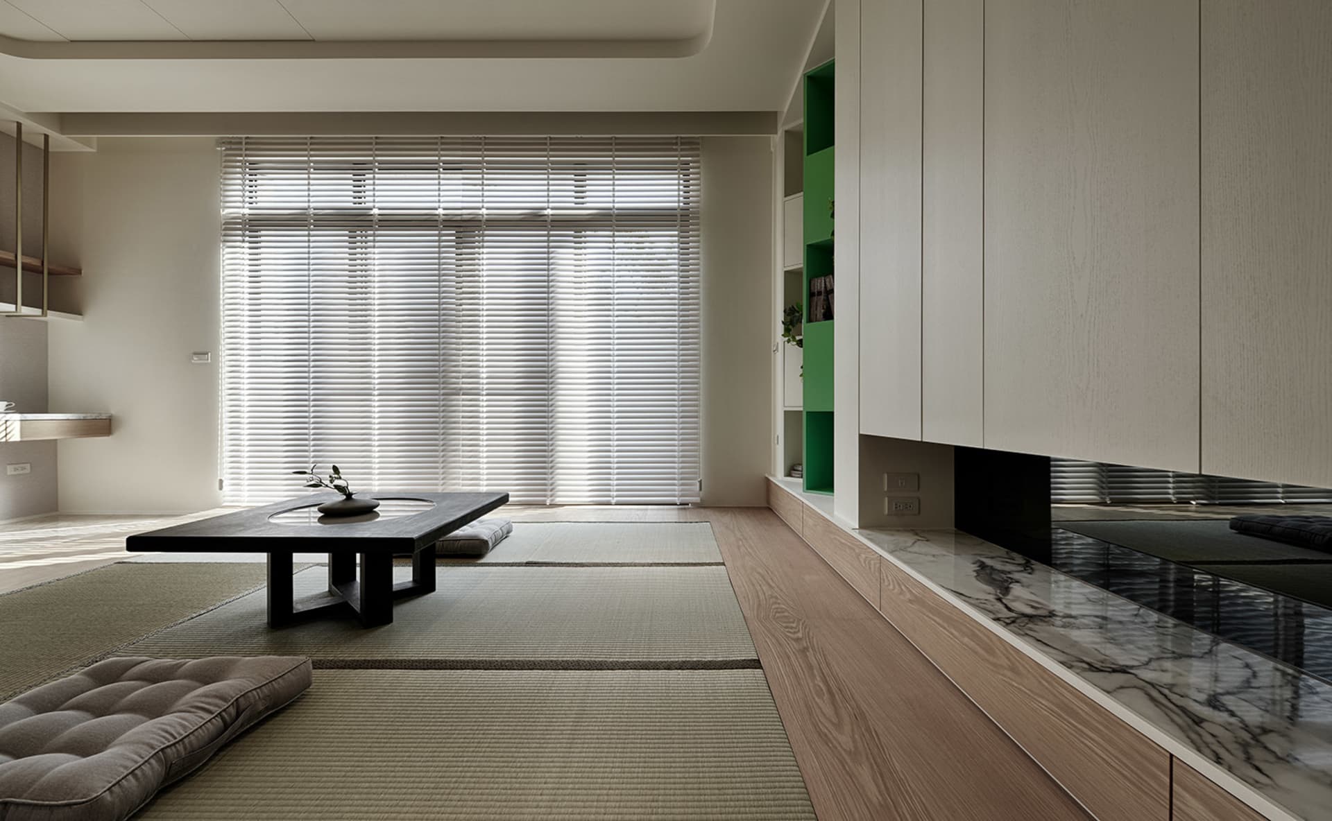 Minimalist living room with wooden furniture and a marble countertop.