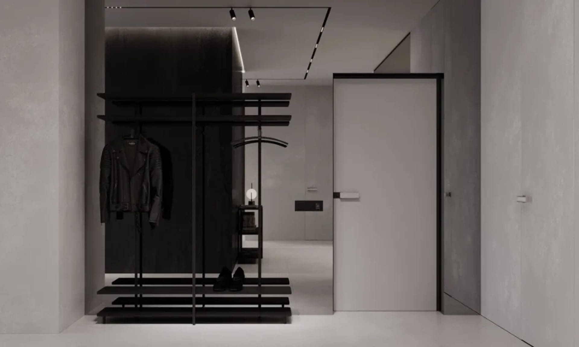 Modern entryway featuring a sleek, minimalist design with metal and glass elements.