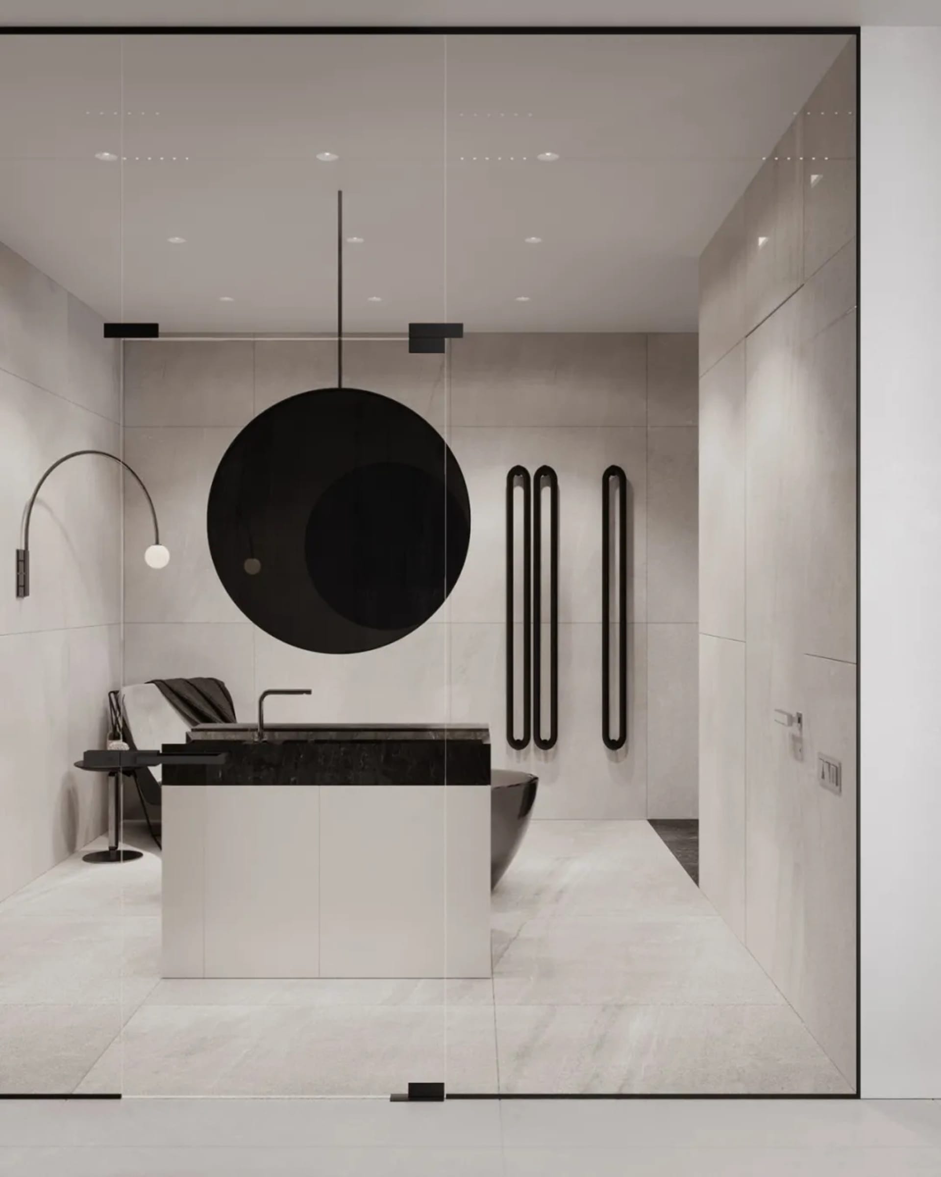 A modern minimalist bathroom with white tiles, black accents, and a floating vanity